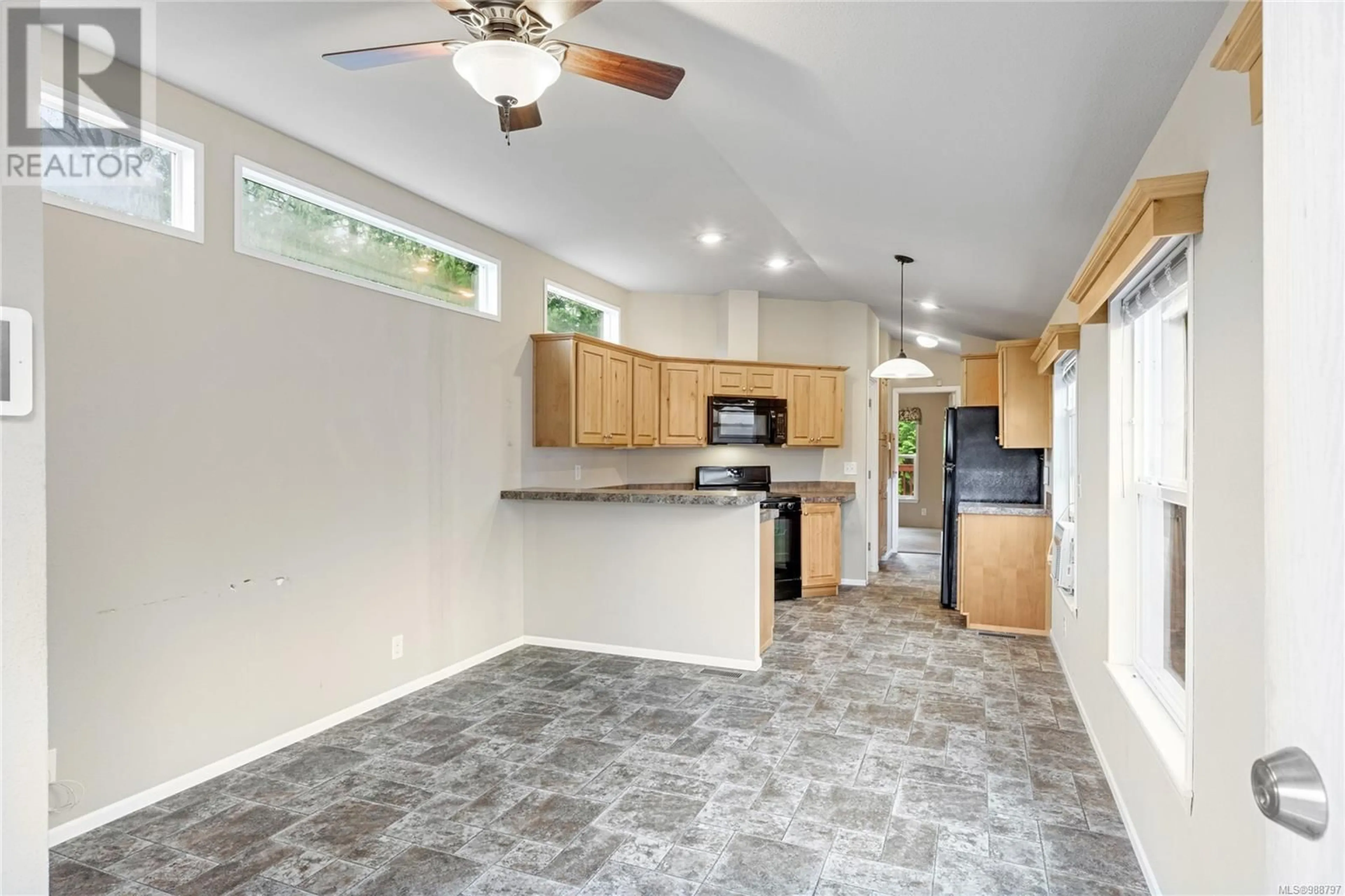 Open concept kitchen, ceramic/tile floor for 124 3042 River Rd, Chemainus British Columbia V0R1K3