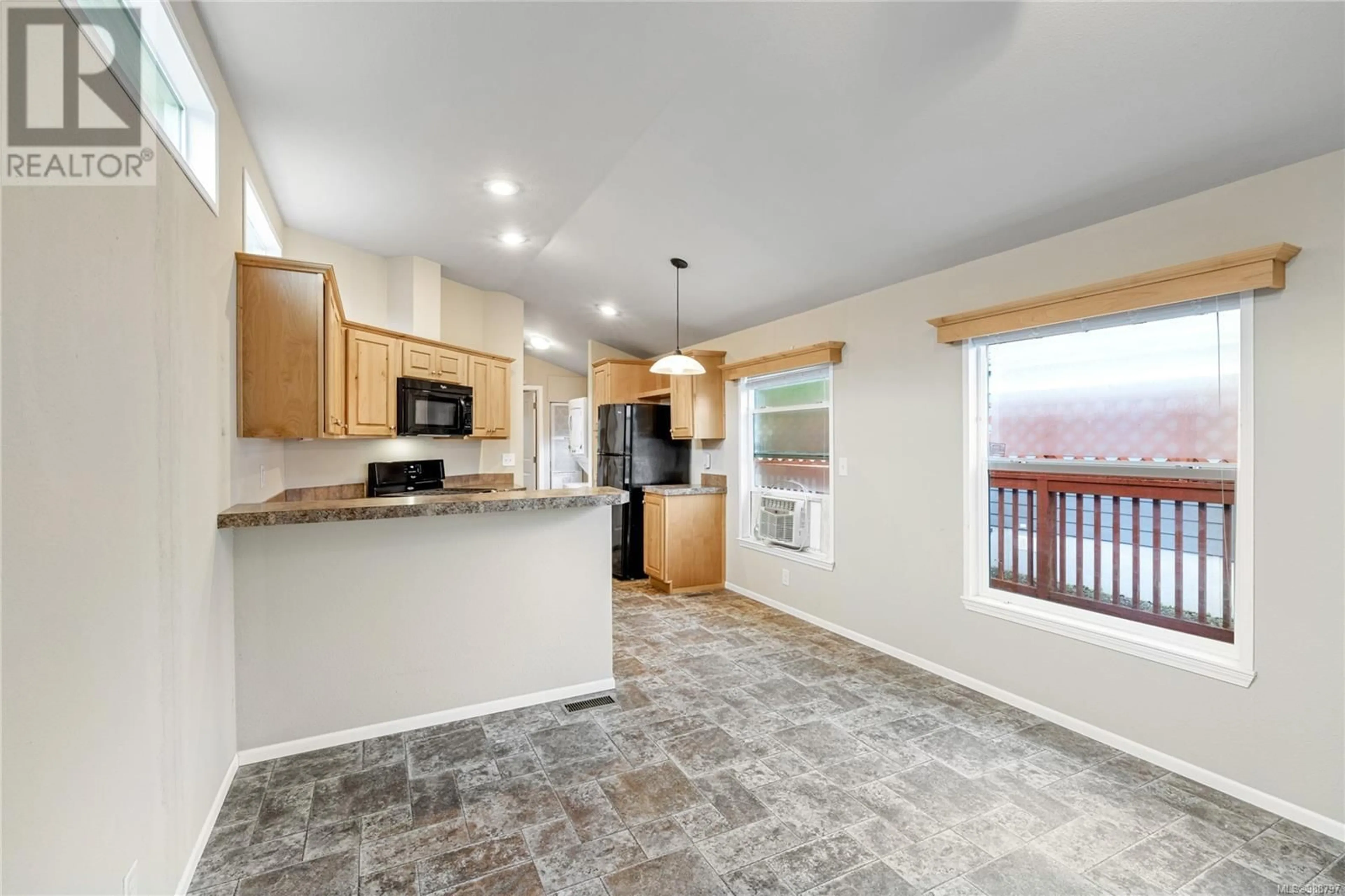 Open concept kitchen, ceramic/tile floor for 124 3042 River Rd, Chemainus British Columbia V0R1K3