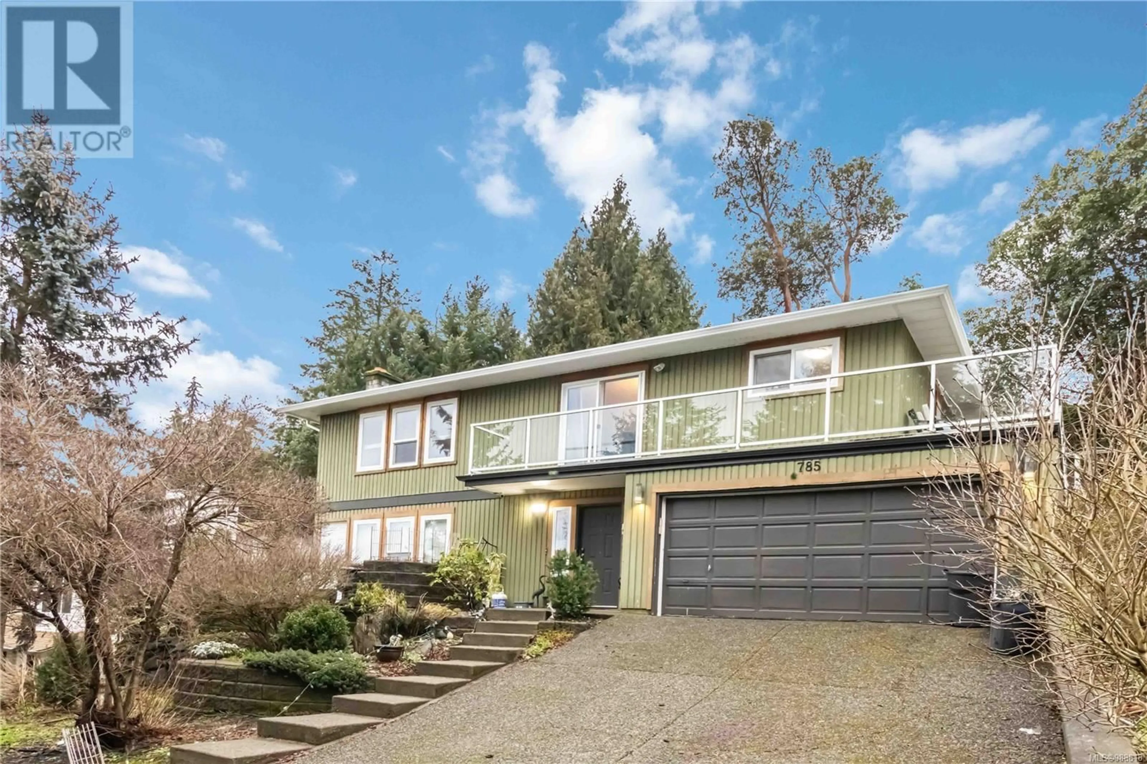 Home with vinyl exterior material, street for 785 Cecil Blogg Dr, Colwood British Columbia V9B5N7