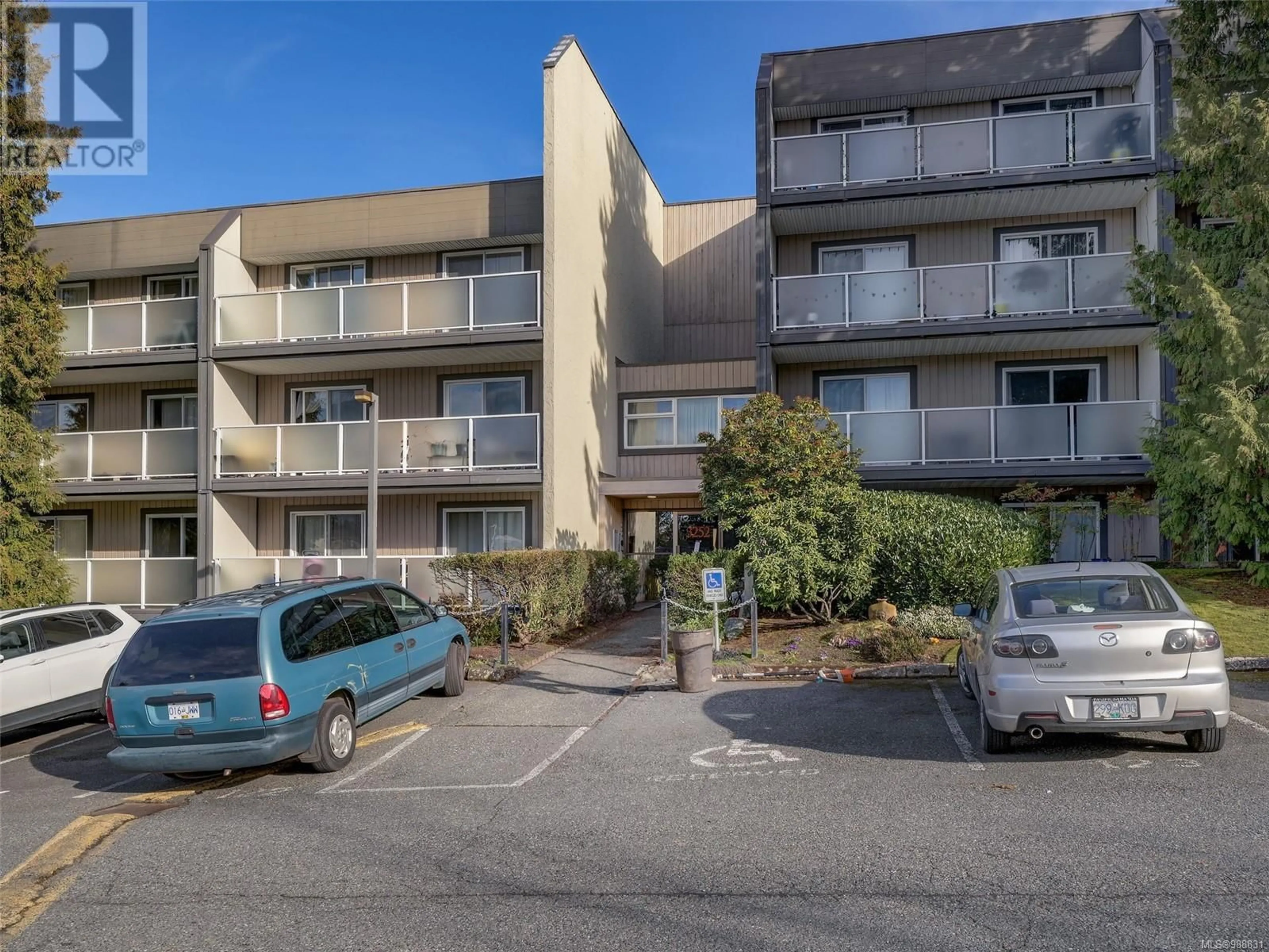 A pic from outside/outdoor area/front of a property/back of a property/a pic from drone, street for 110 3252 Glasgow Ave, Saanich British Columbia V8X1M2