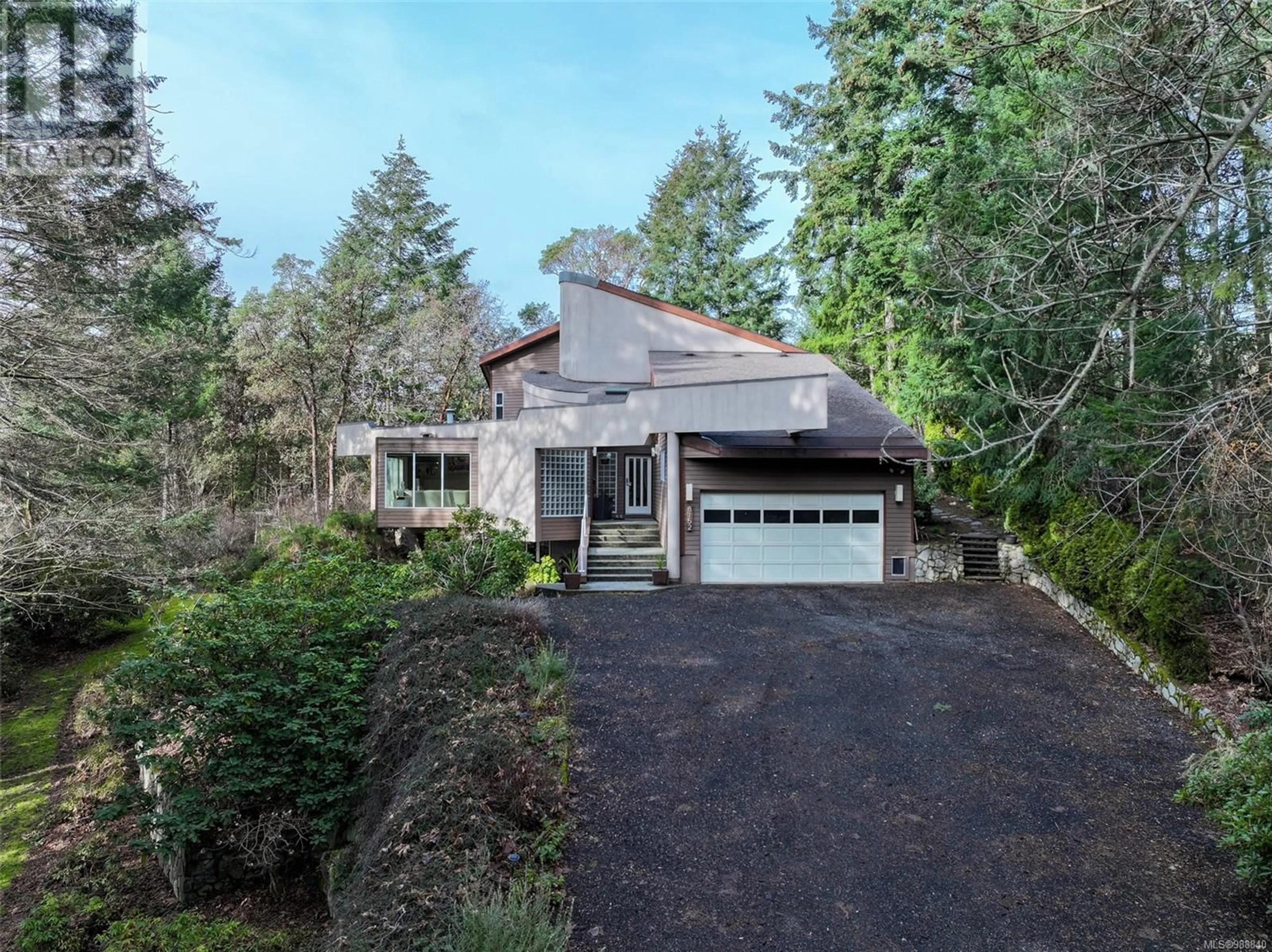 A pic from outside/outdoor area/front of a property/back of a property/a pic from drone, street for 8152 Woodwyn Terr, Central Saanich British Columbia V8M1S2