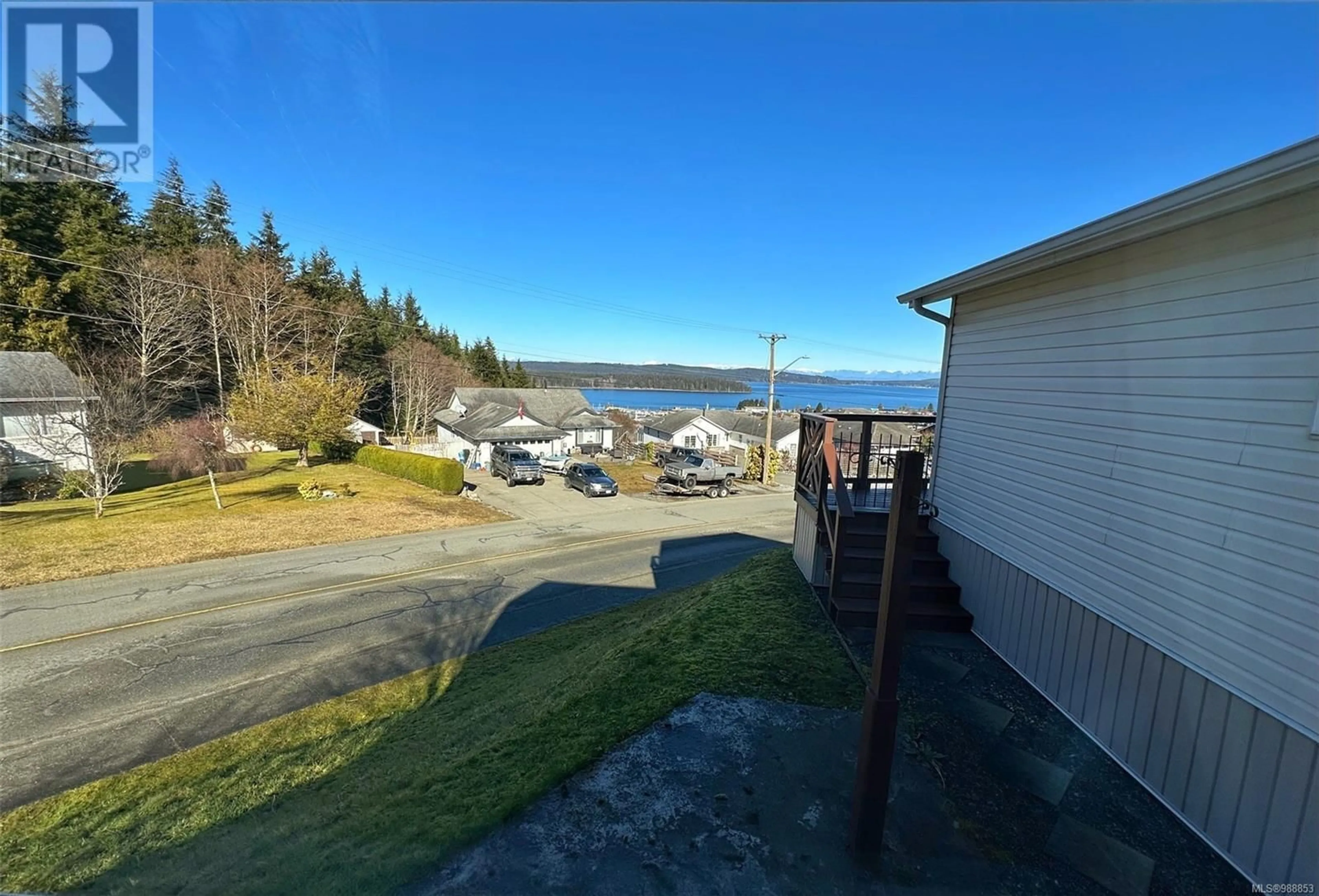 A pic from outside/outdoor area/front of a property/back of a property/a pic from drone, water/lake/river/ocean view for 1780 Jordan Pl, Port McNeill British Columbia V0N2R0