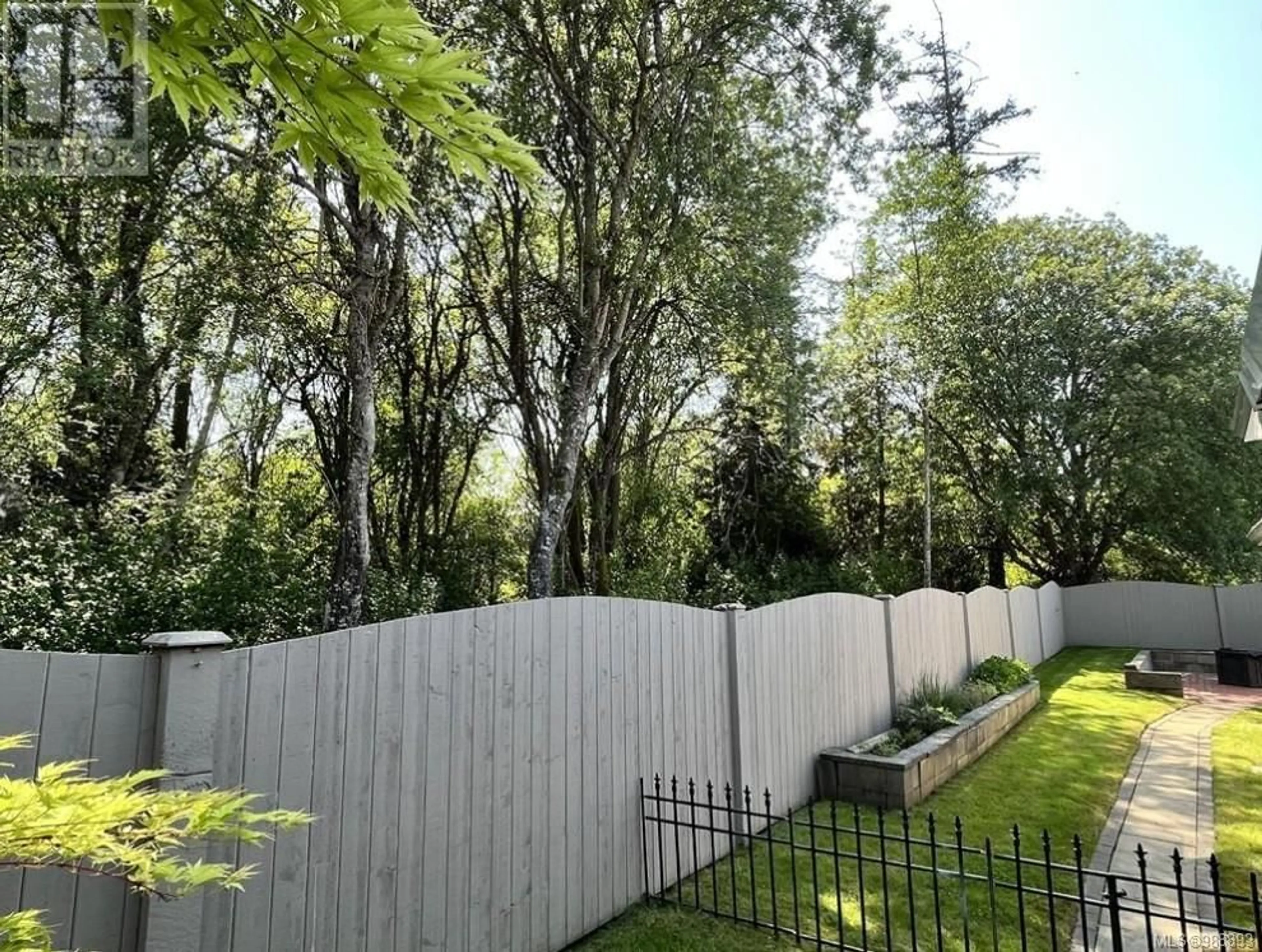 A pic from outside/outdoor area/front of a property/back of a property/a pic from drone, forest/trees view for 25 7509 Central Saanich Rd, Central Saanich British Columbia V8M2B5