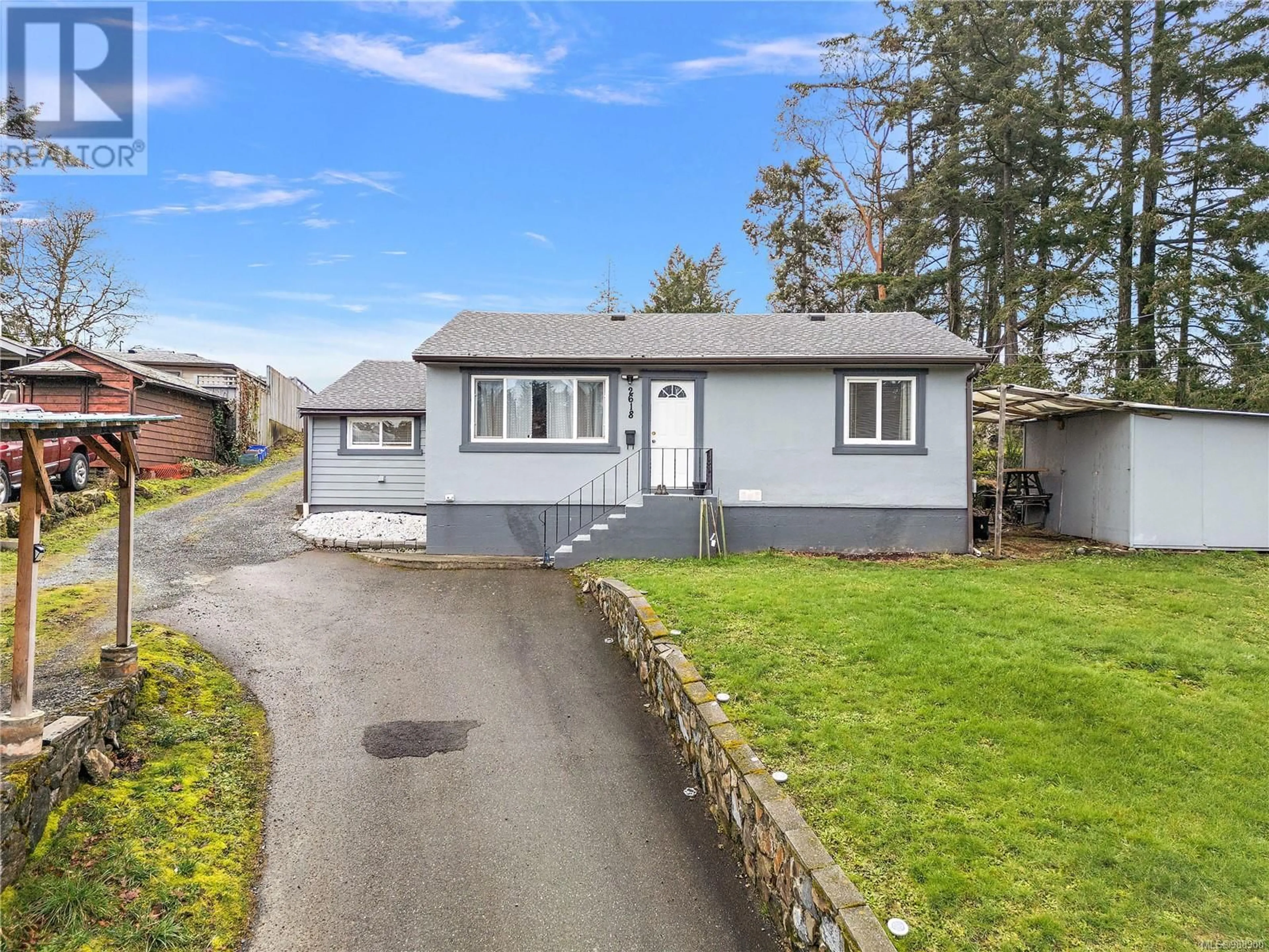 Home with vinyl exterior material, street for 2618 Wentwich Rd, Langford British Columbia V9B3N6