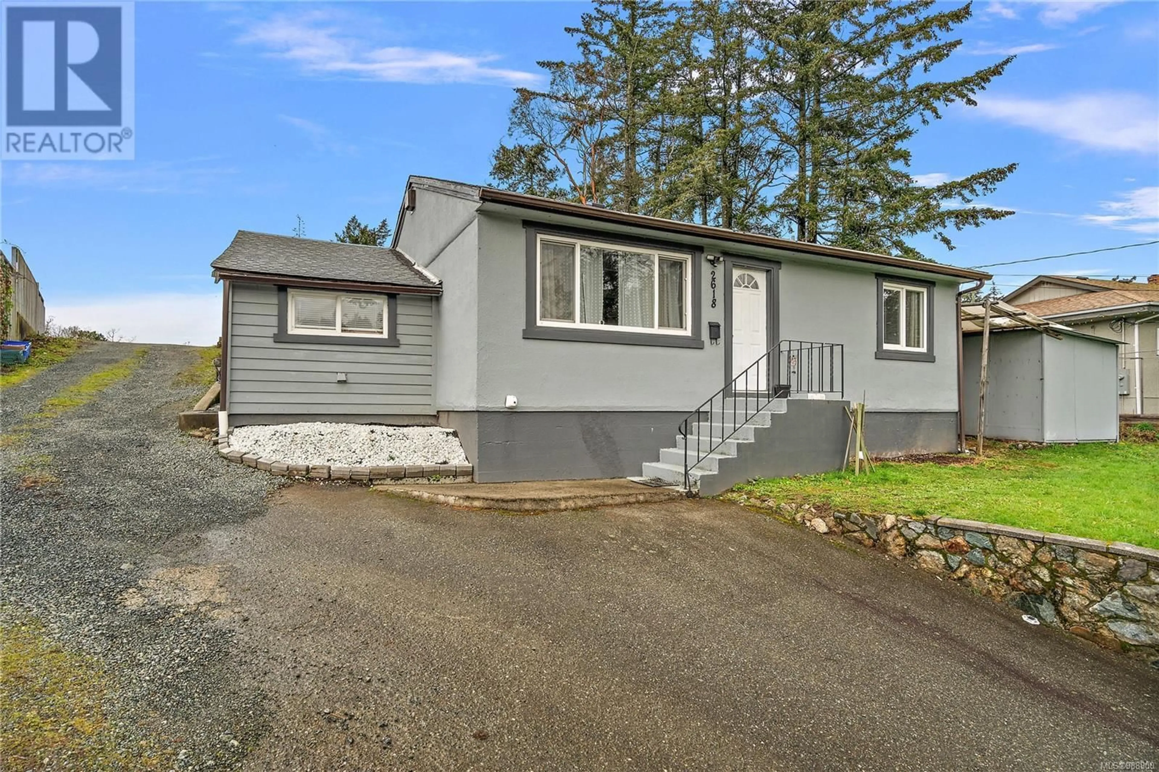 Home with vinyl exterior material, street for 2618 Wentwich Rd, Langford British Columbia V9B3N6