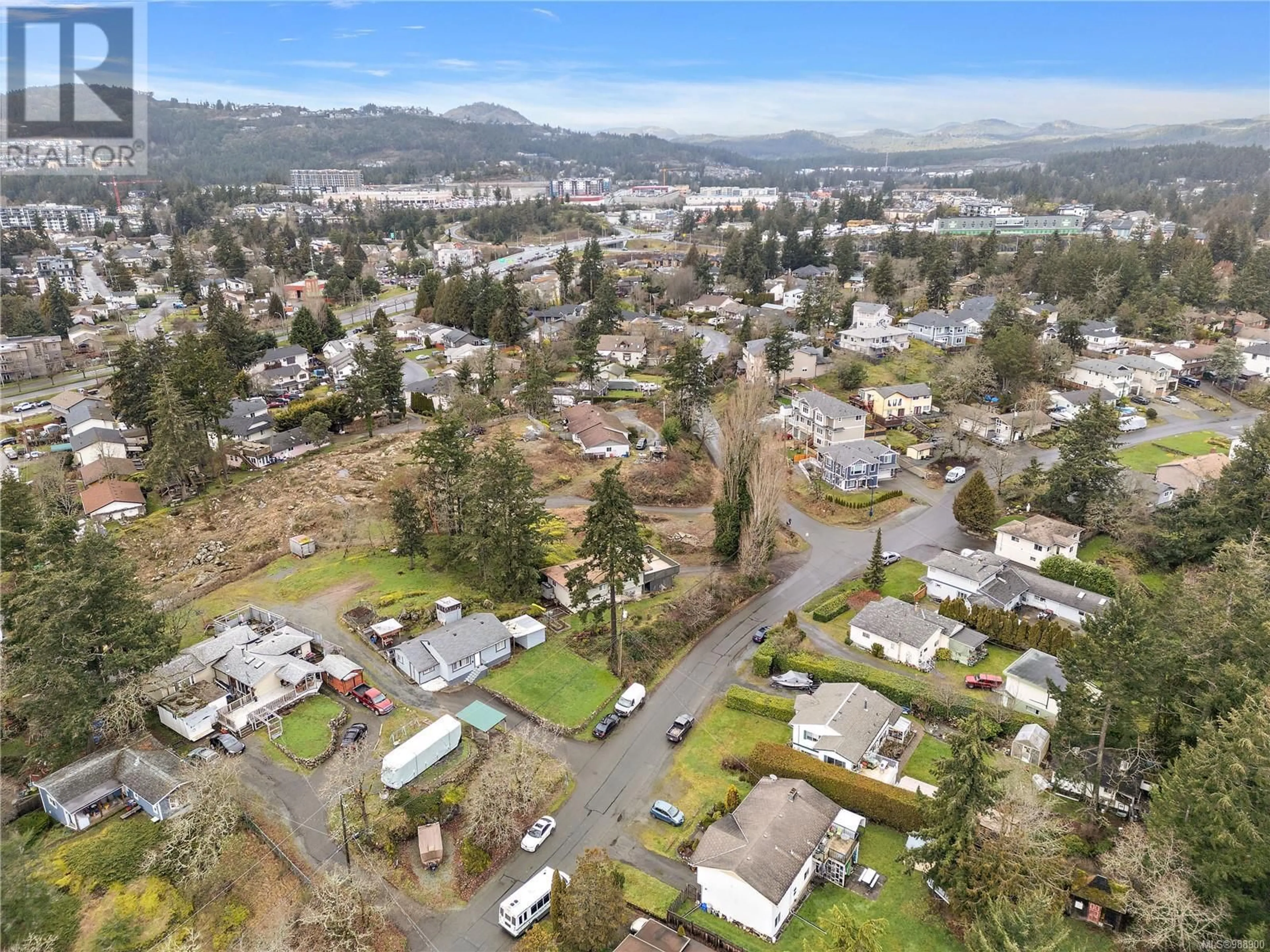 A pic from outside/outdoor area/front of a property/back of a property/a pic from drone, mountain view for 2618 Wentwich Rd, Langford British Columbia V9B3N6