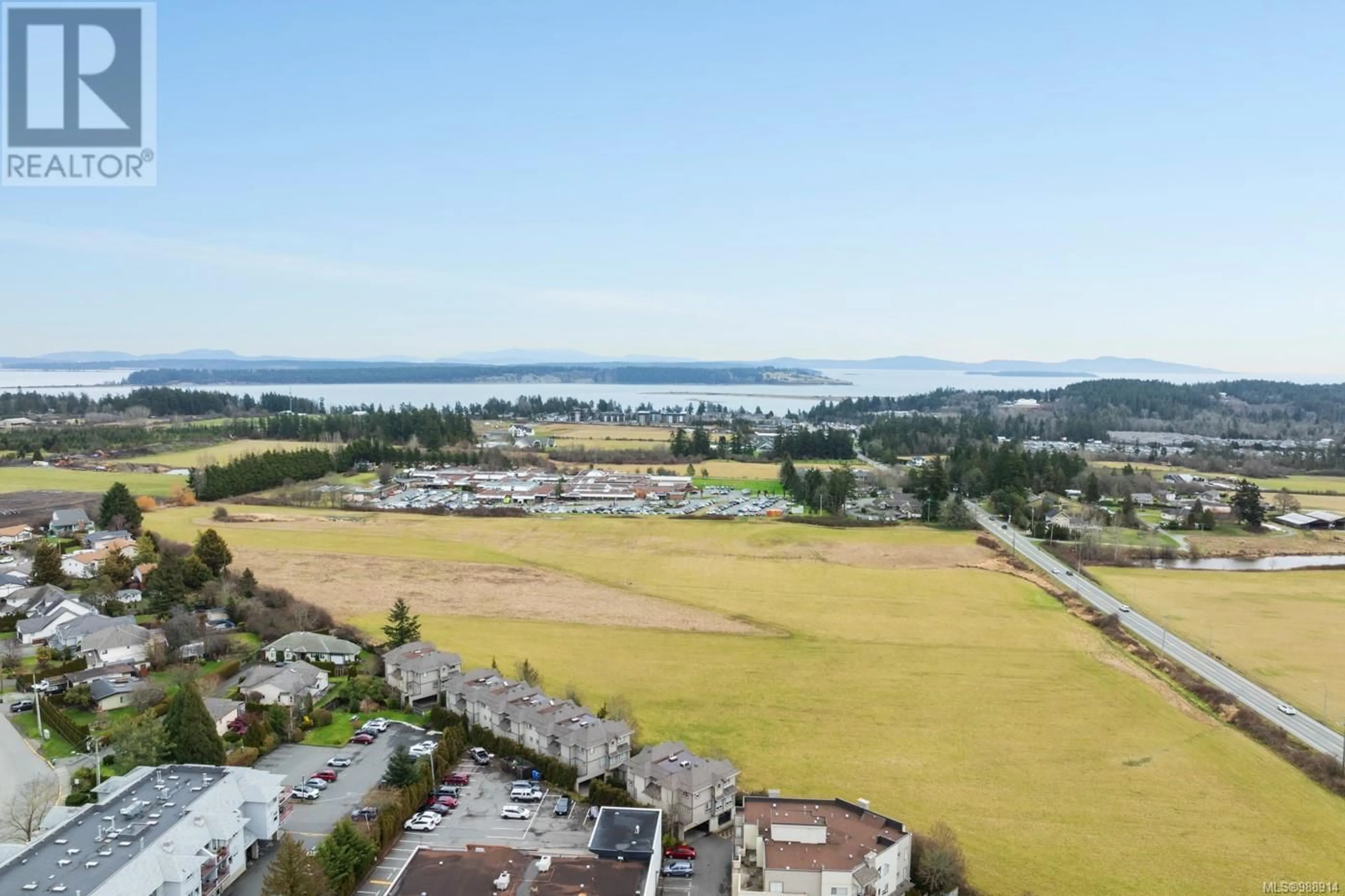 A pic from outside/outdoor area/front of a property/back of a property/a pic from drone, water/lake/river/ocean view for 1 7847 East Saanich Rd, Central Saanich British Columbia V8M2B4