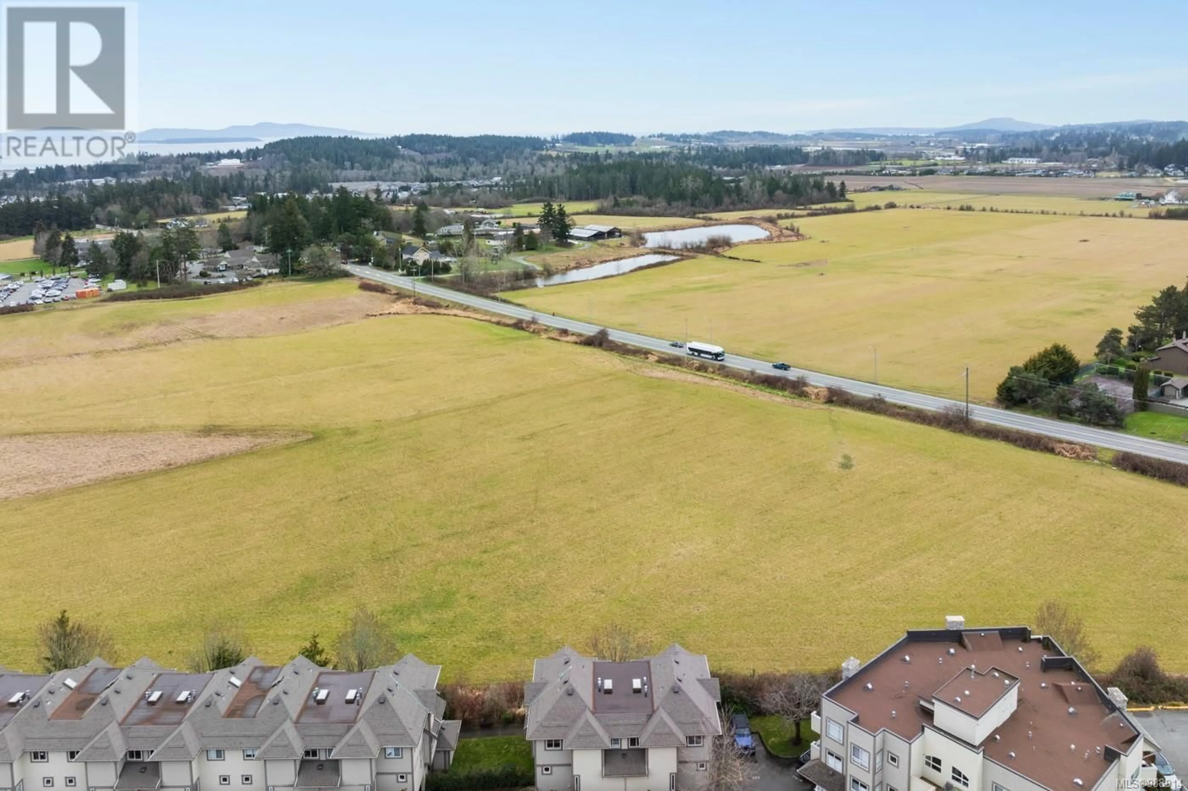 A pic from outside/outdoor area/front of a property/back of a property/a pic from drone, mountain view for 1 7847 East Saanich Rd, Central Saanich British Columbia V8M2B4