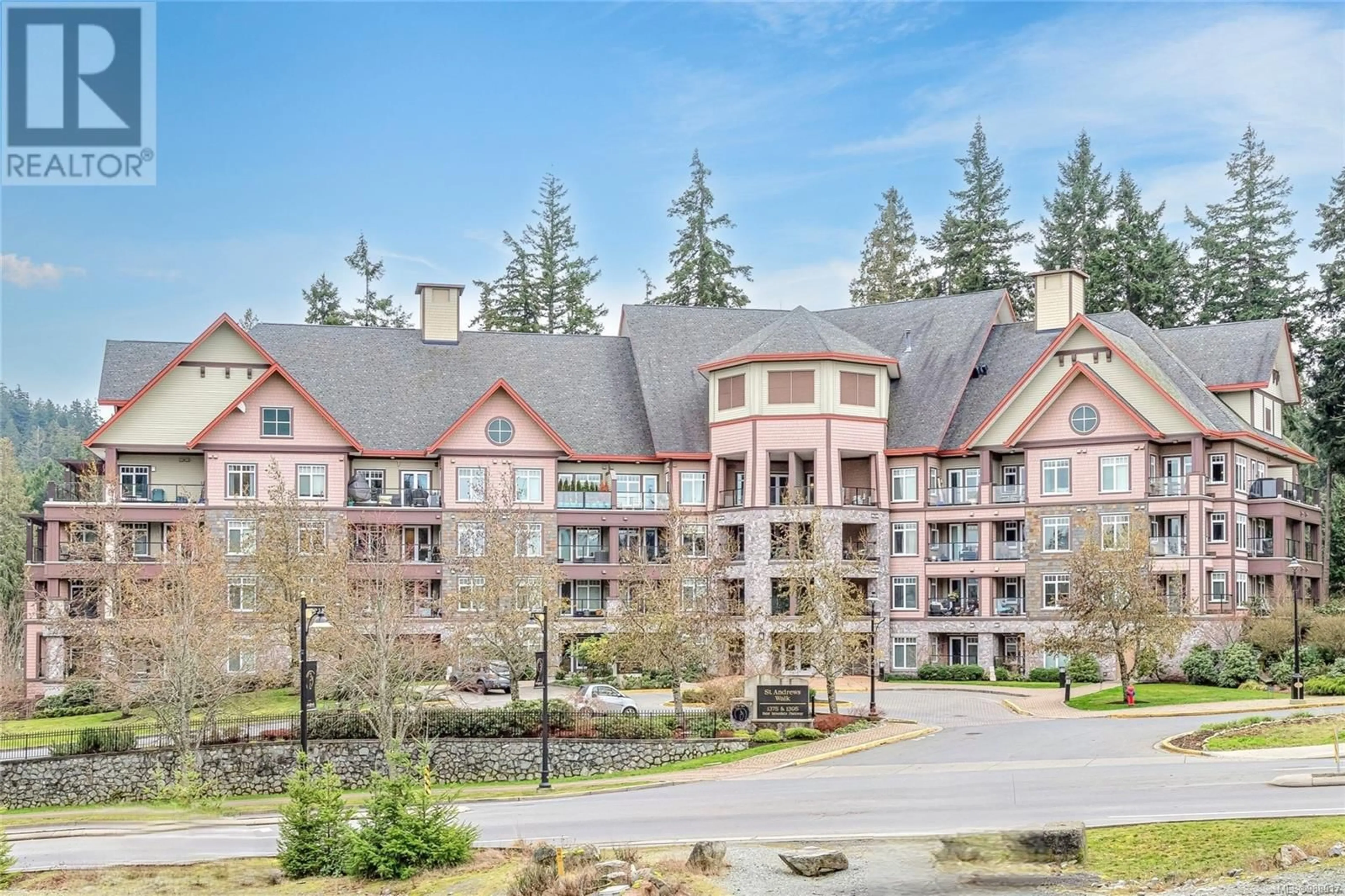 A pic from outside/outdoor area/front of a property/back of a property/a pic from drone, mountain view for 104 - 1395 BEAR MOUNTAIN PARKWAY, Langford British Columbia V9B0E1