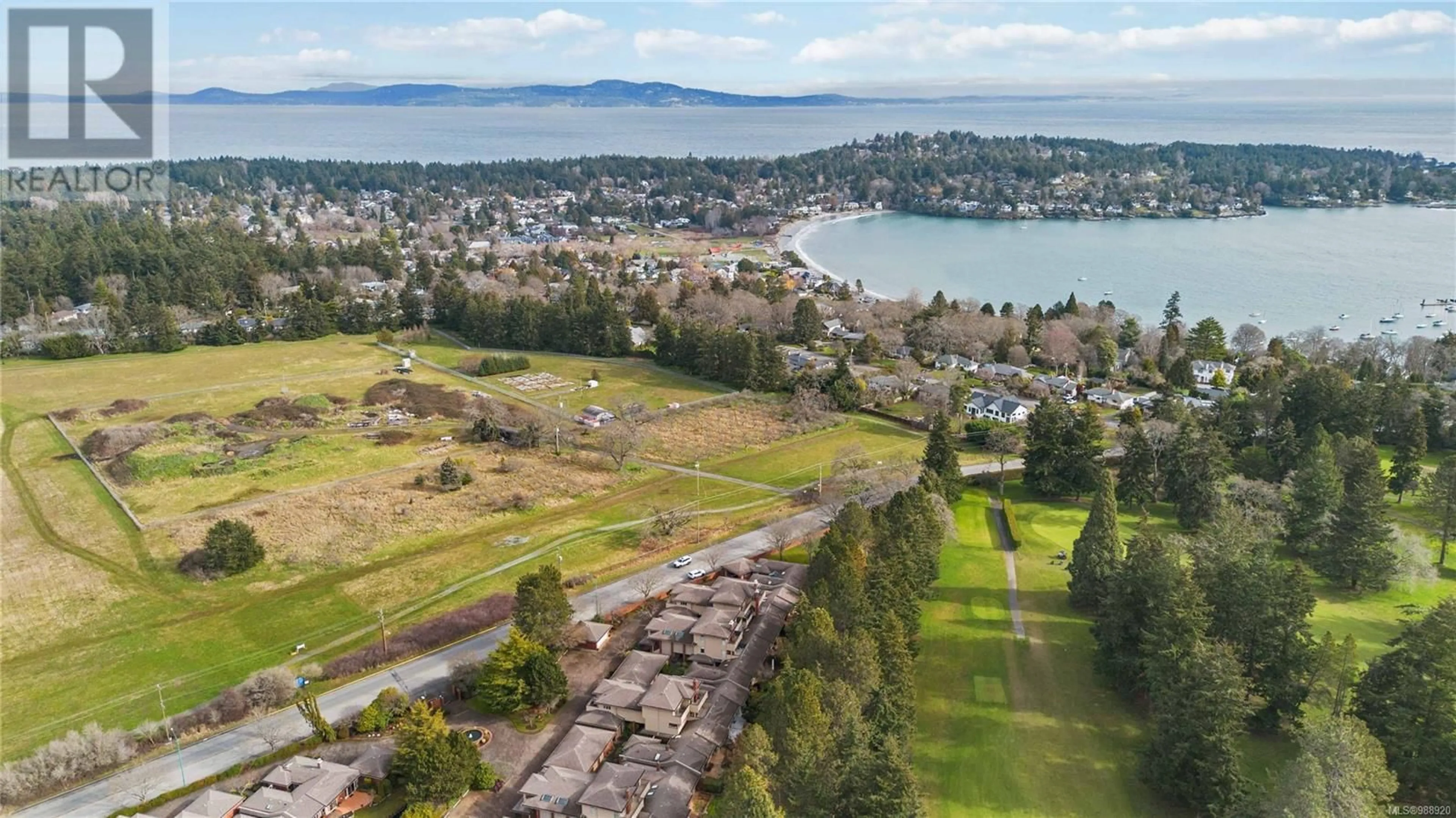 A pic from outside/outdoor area/front of a property/back of a property/a pic from drone, water/lake/river/ocean view for 103 - 2345 CEDAR HILL CROSS ROAD, Oak Bay British Columbia V8P5M8