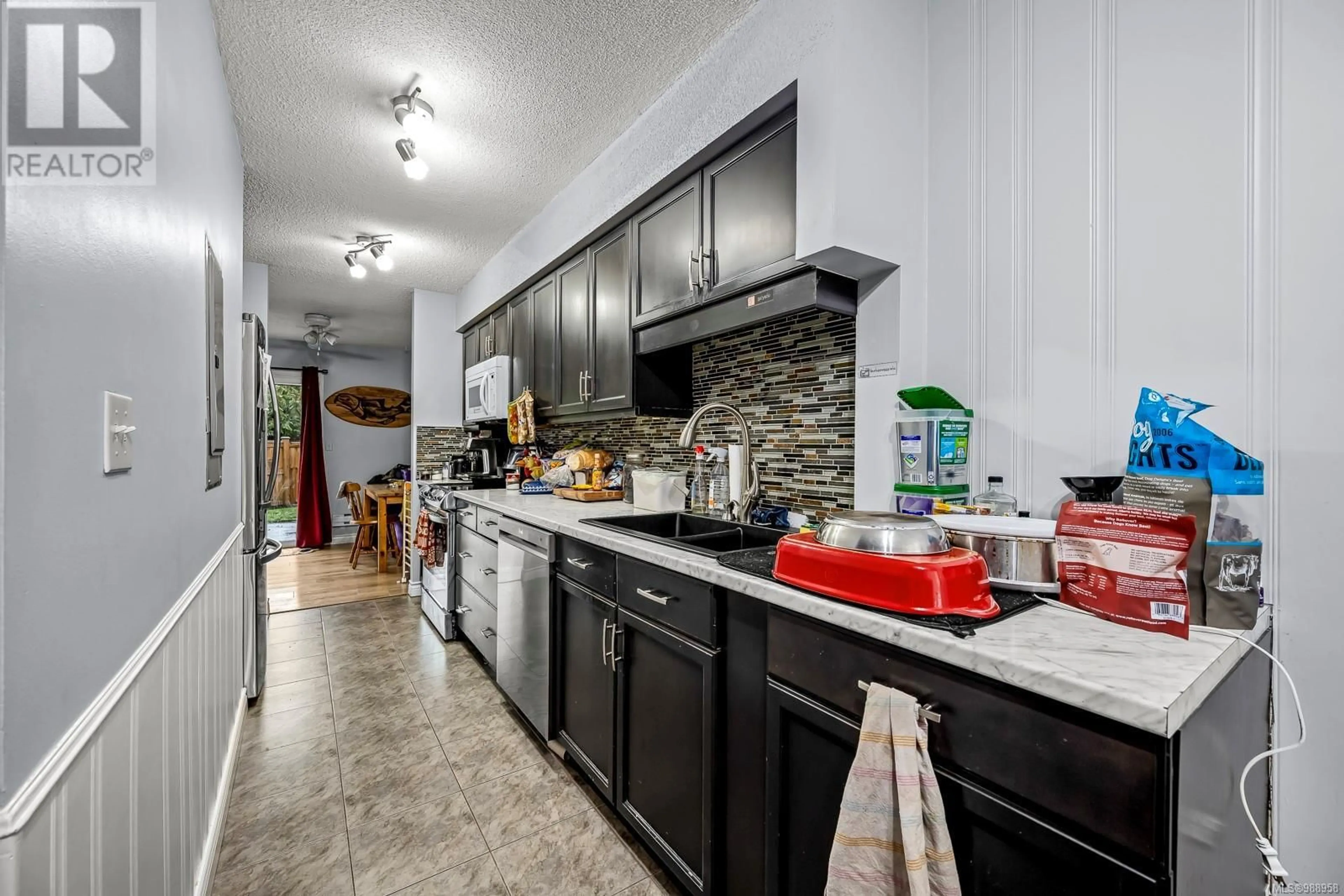 Open concept kitchen, ceramic/tile floor for 44 1957 Guthrie Rd, Comox British Columbia V9M2J2