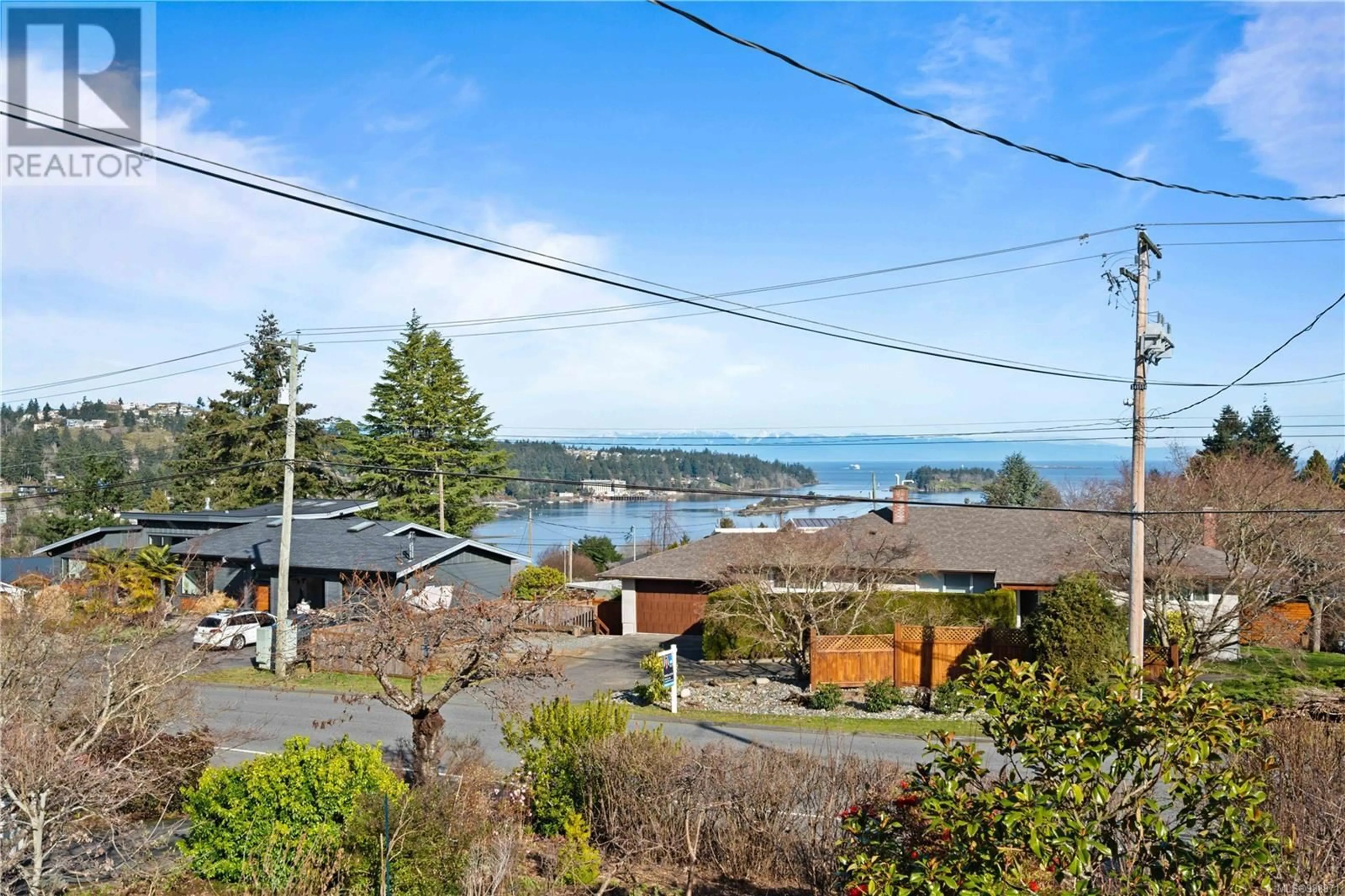 A pic from outside/outdoor area/front of a property/back of a property/a pic from drone, water/lake/river/ocean view for 2575 Glenayr Dr, Nanaimo British Columbia V9S3R9