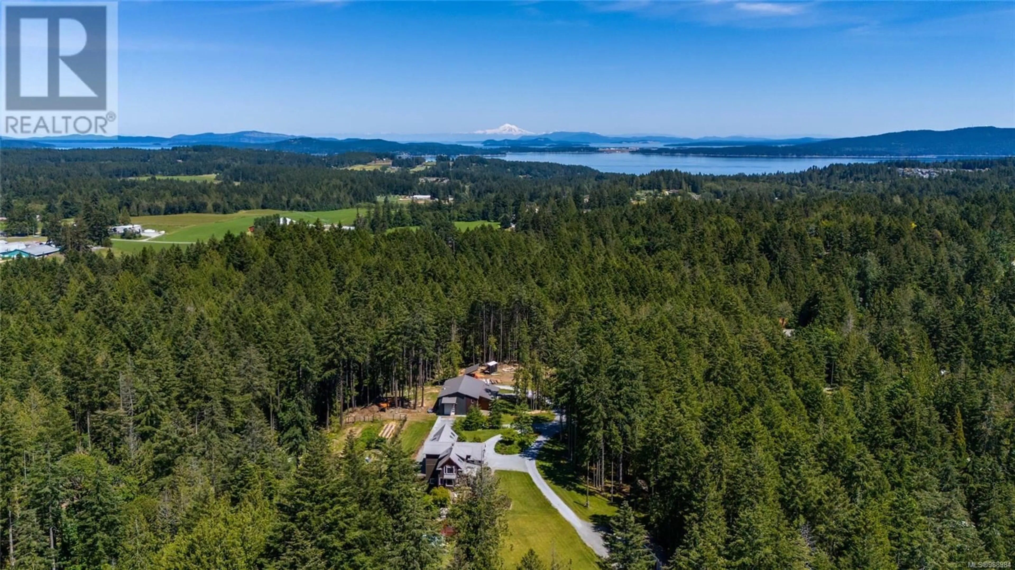 A pic from outside/outdoor area/front of a property/back of a property/a pic from drone, water/lake/river/ocean view for 1381 Carlton Dr, Cobble Hill British Columbia V8H0B7