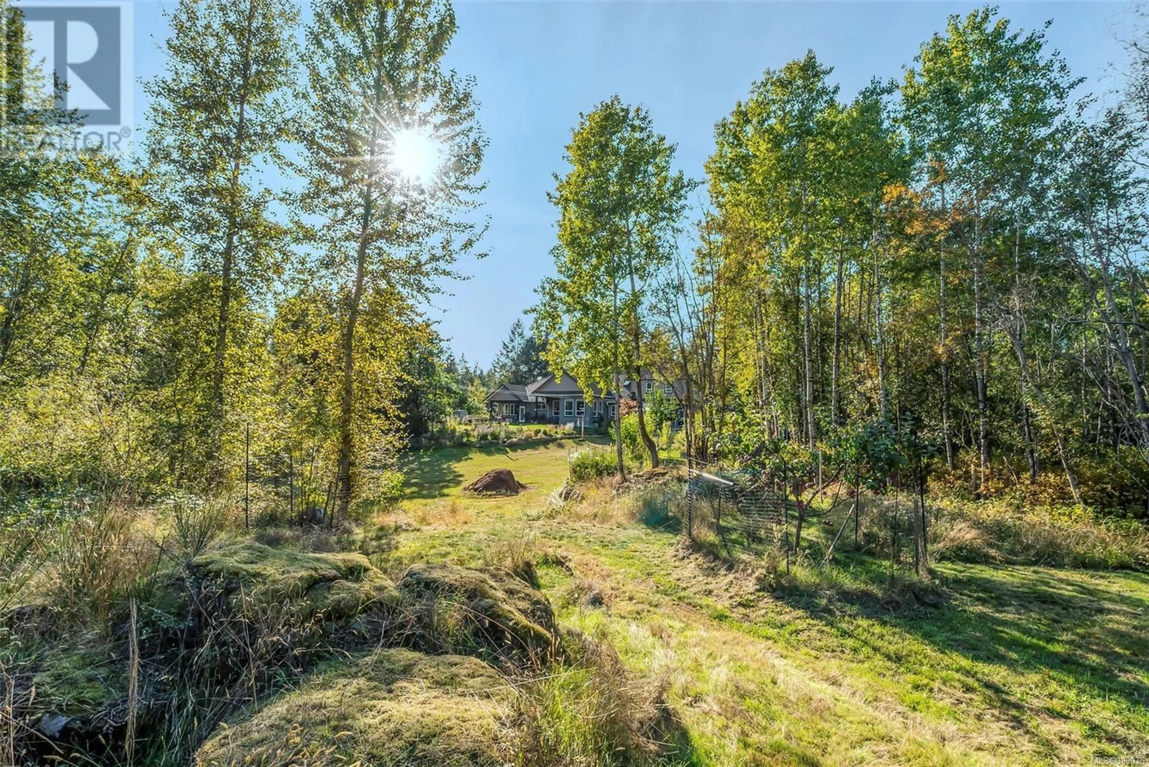 A pic from outside/outdoor area/front of a property/back of a property/a pic from drone, forest/trees view for 1390 Kurtis Cres, Nanaimo British Columbia V9X1X3