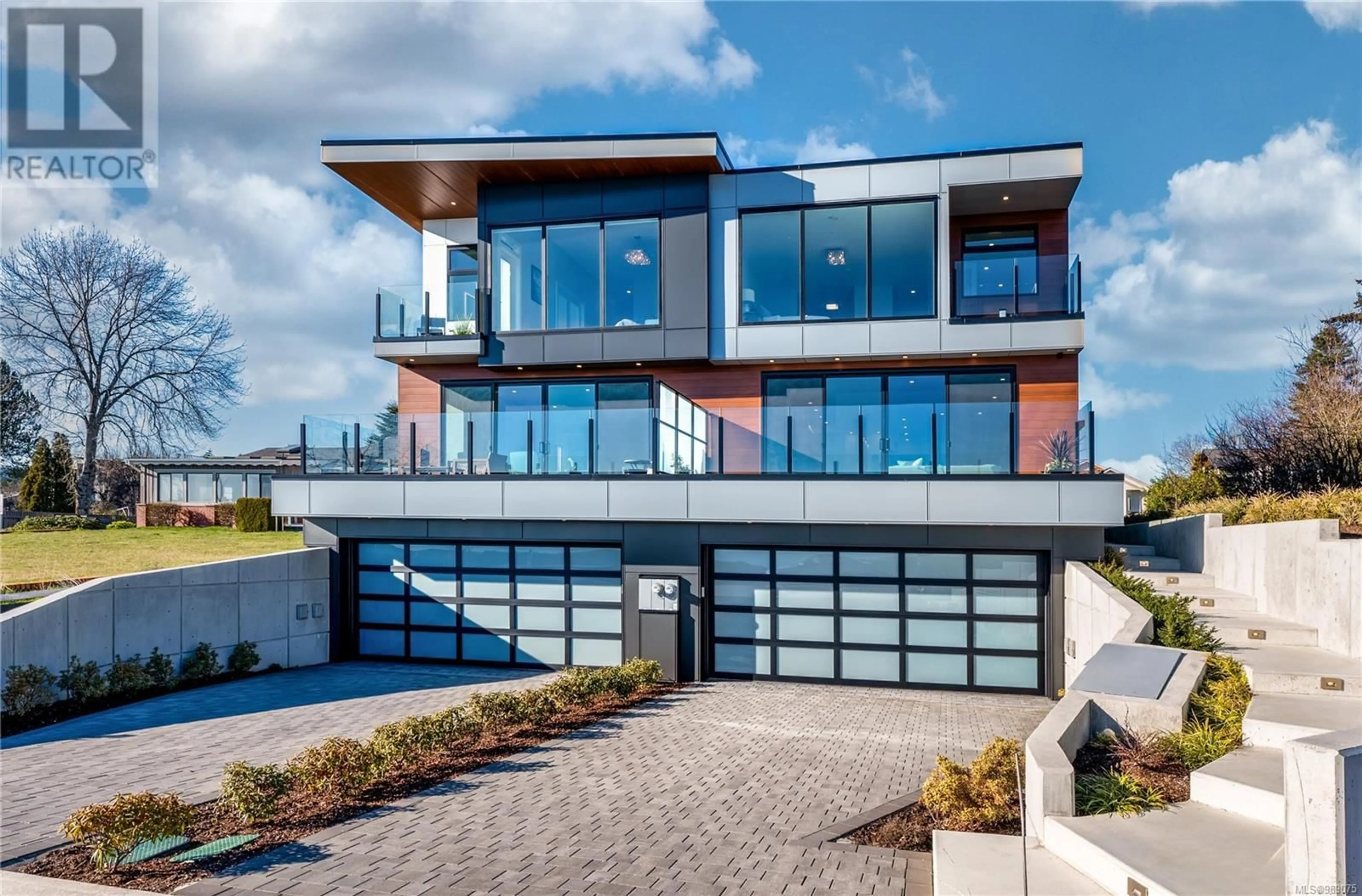 Home with brick exterior material, unknown for 2 - 9360 LOCHSIDE DRIVE, Sidney British Columbia V8L1N7