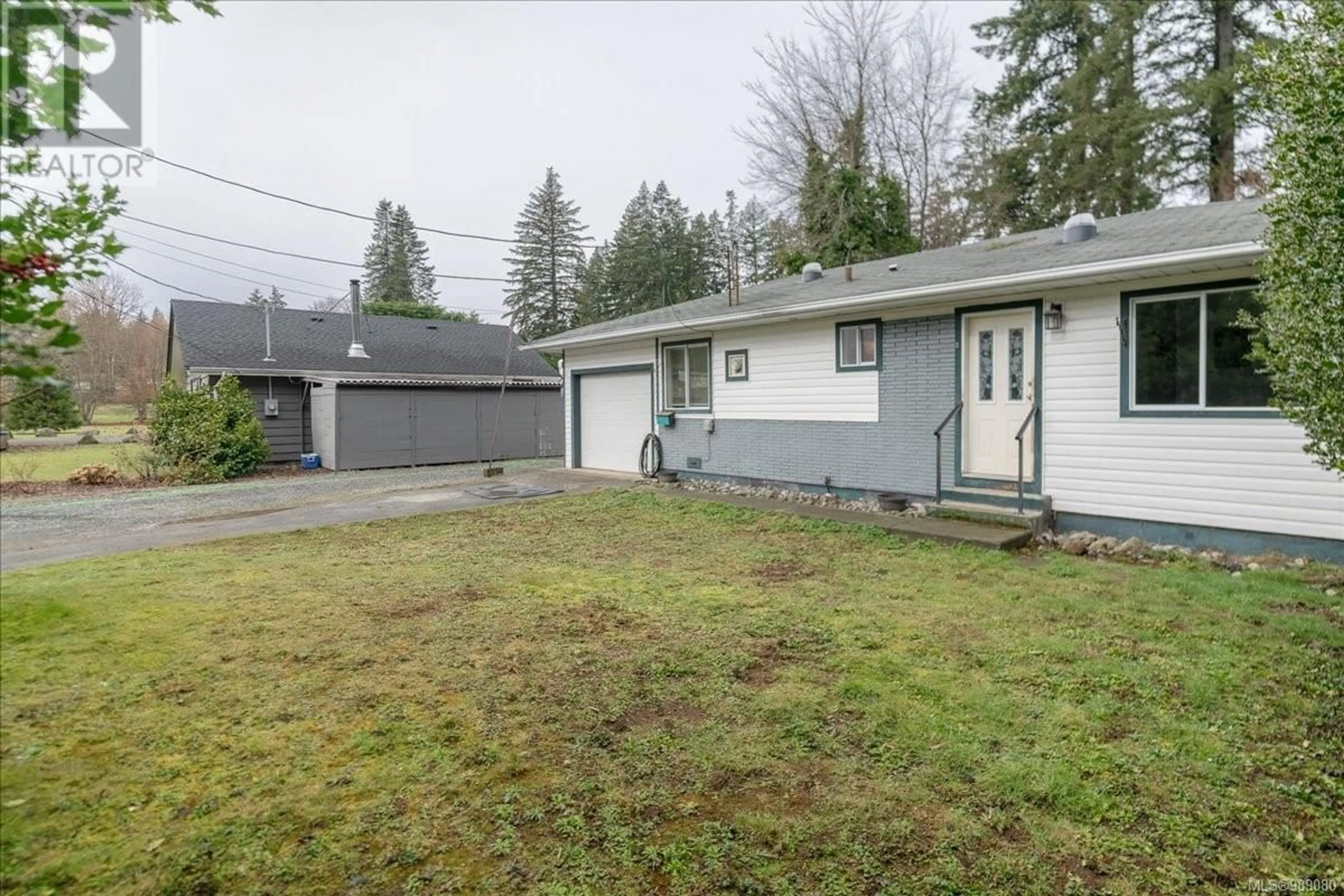 A pic from outside/outdoor area/front of a property/back of a property/a pic from drone, street for 3071 Baker Rd, Duncan British Columbia V9L1K8