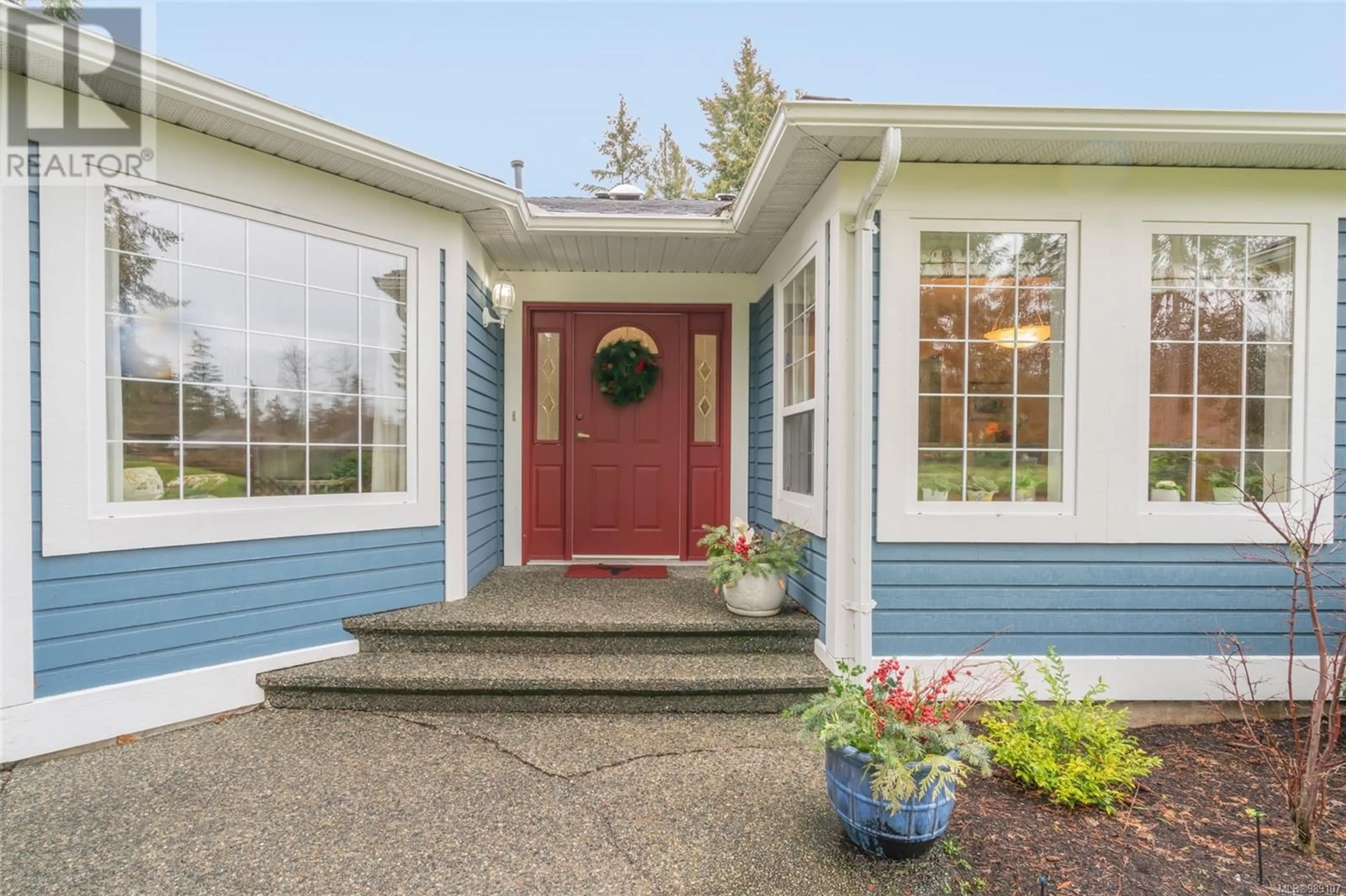 Home with vinyl exterior material, street for 1323 Leeward Way, Qualicum Beach British Columbia V9K2M1