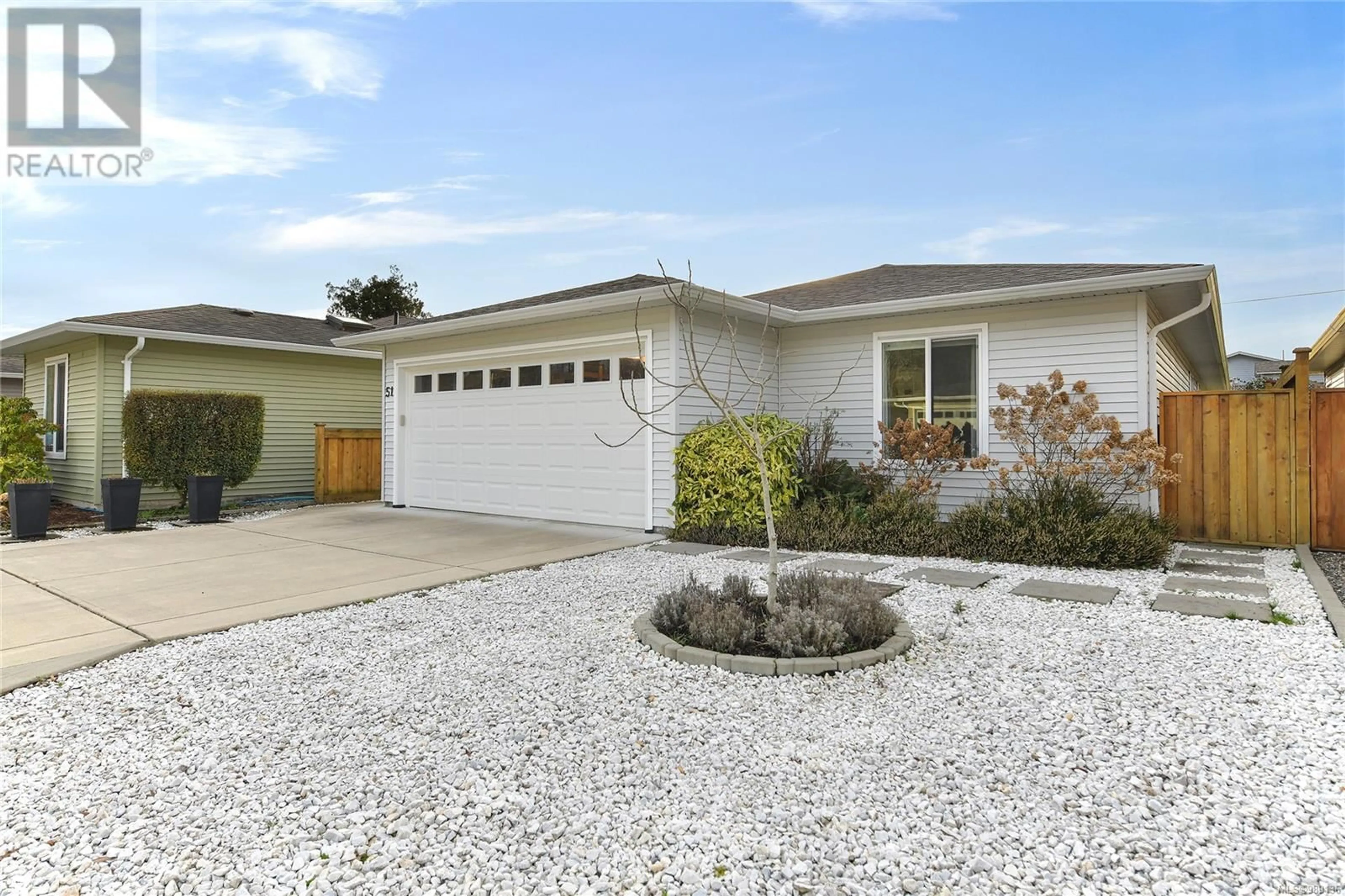 Home with vinyl exterior material, street for 51 - 7586 TETAYUT ROAD, Central Saanich British Columbia V8M0B4