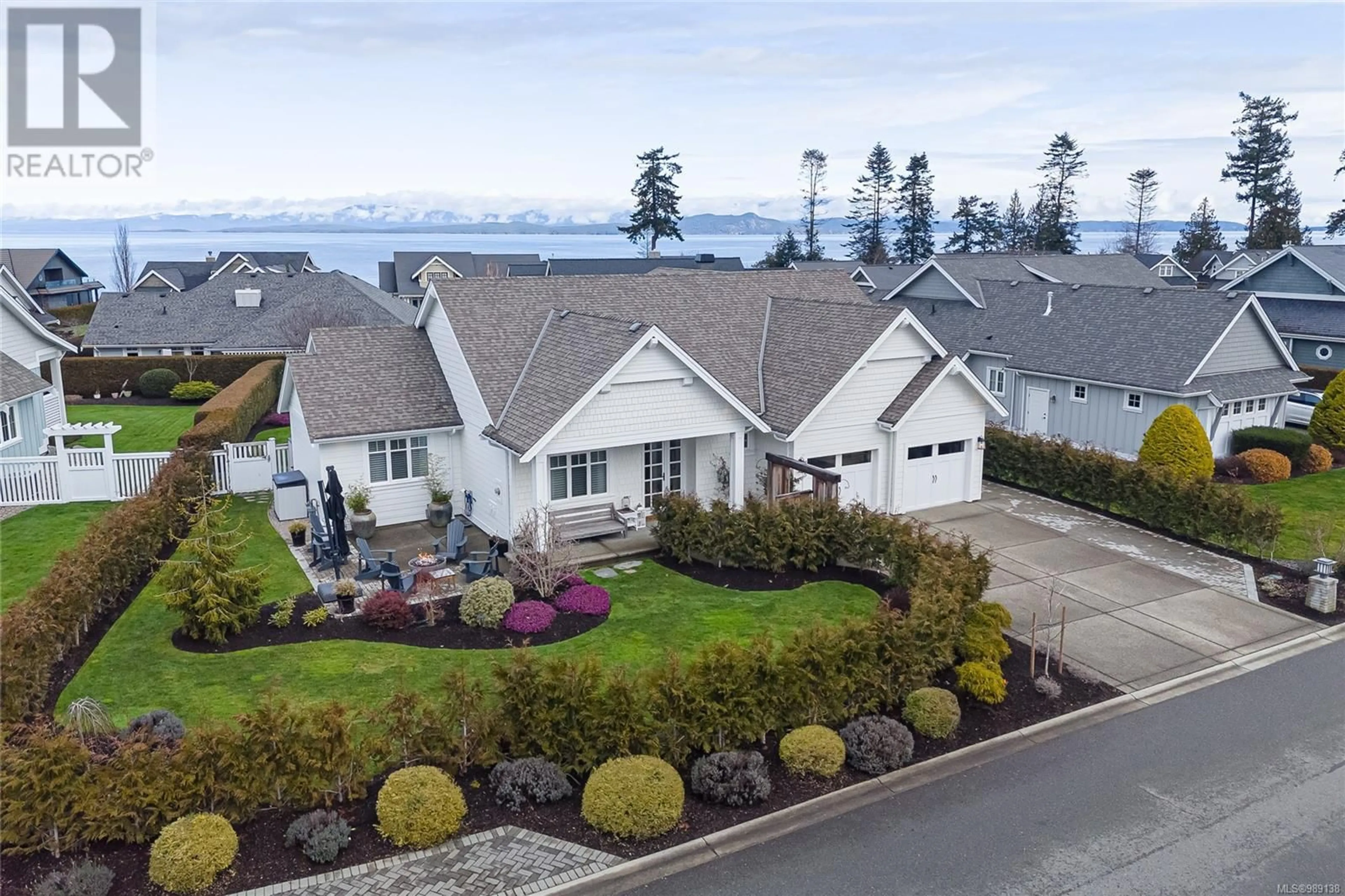 A pic from outside/outdoor area/front of a property/back of a property/a pic from drone, water/lake/river/ocean view for 815 Bluffs Dr, Qualicum Beach British Columbia V9K0A2