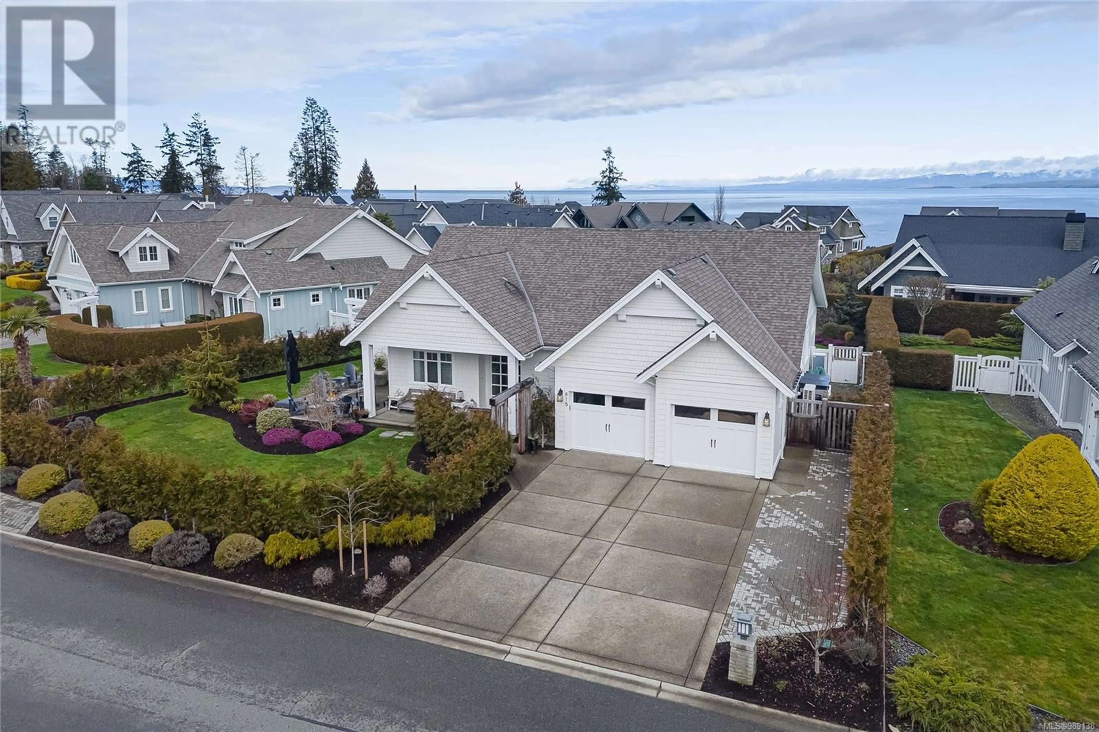 A pic from outside/outdoor area/front of a property/back of a property/a pic from drone, water/lake/river/ocean view for 815 Bluffs Dr, Qualicum Beach British Columbia V9K0A2