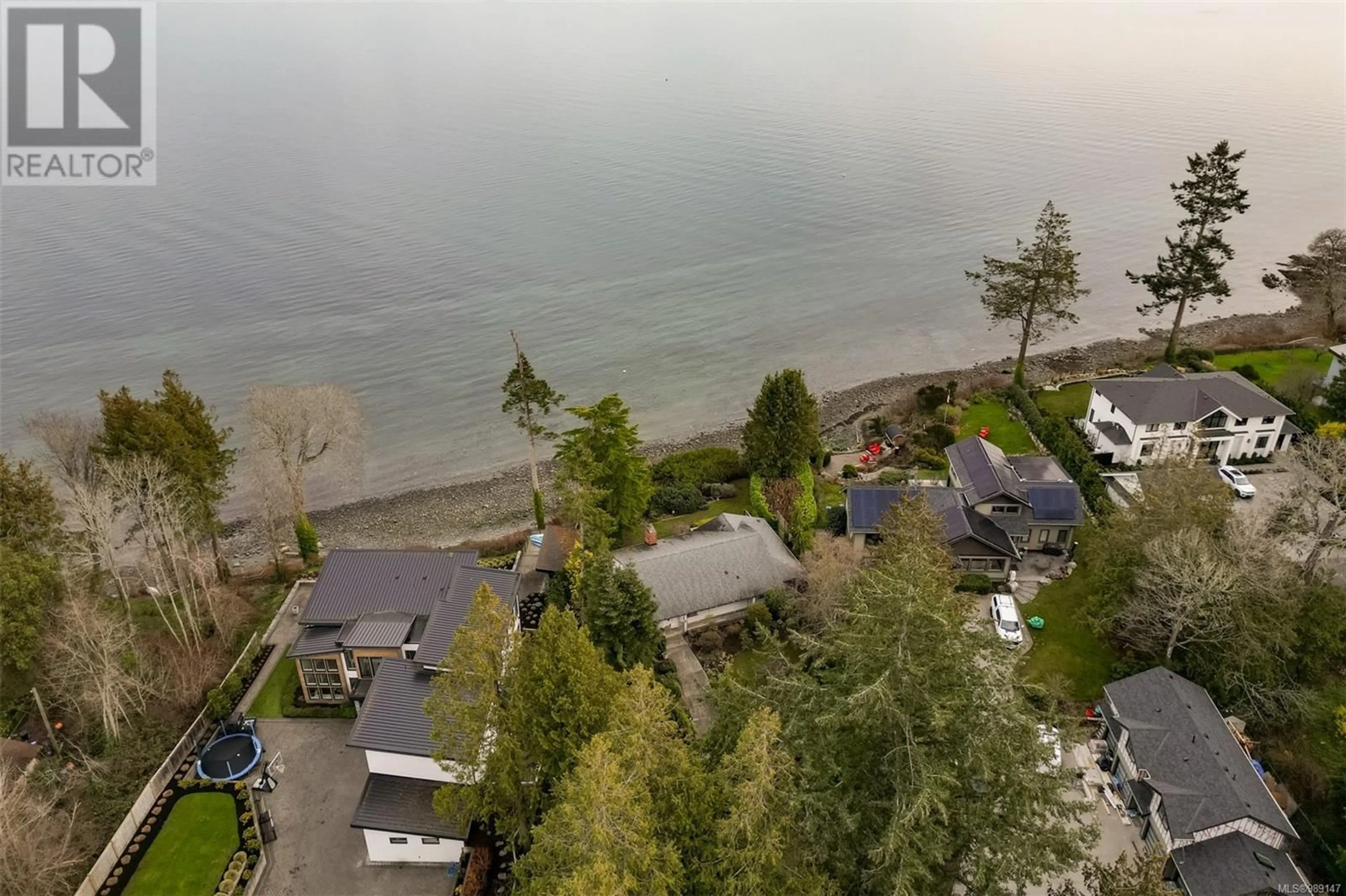 A pic from outside/outdoor area/front of a property/back of a property/a pic from drone, water/lake/river/ocean view for 8441 LOCHSIDE DRIVE, Central Saanich British Columbia V8M1T9