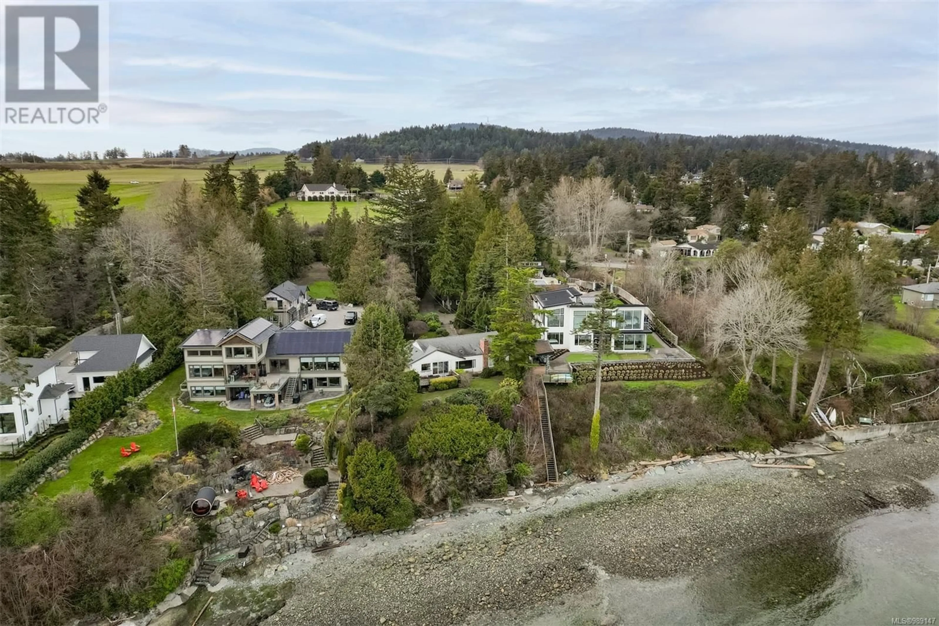 A pic from outside/outdoor area/front of a property/back of a property/a pic from drone, water/lake/river/ocean view for 8441 LOCHSIDE DRIVE, Central Saanich British Columbia V8M1T9