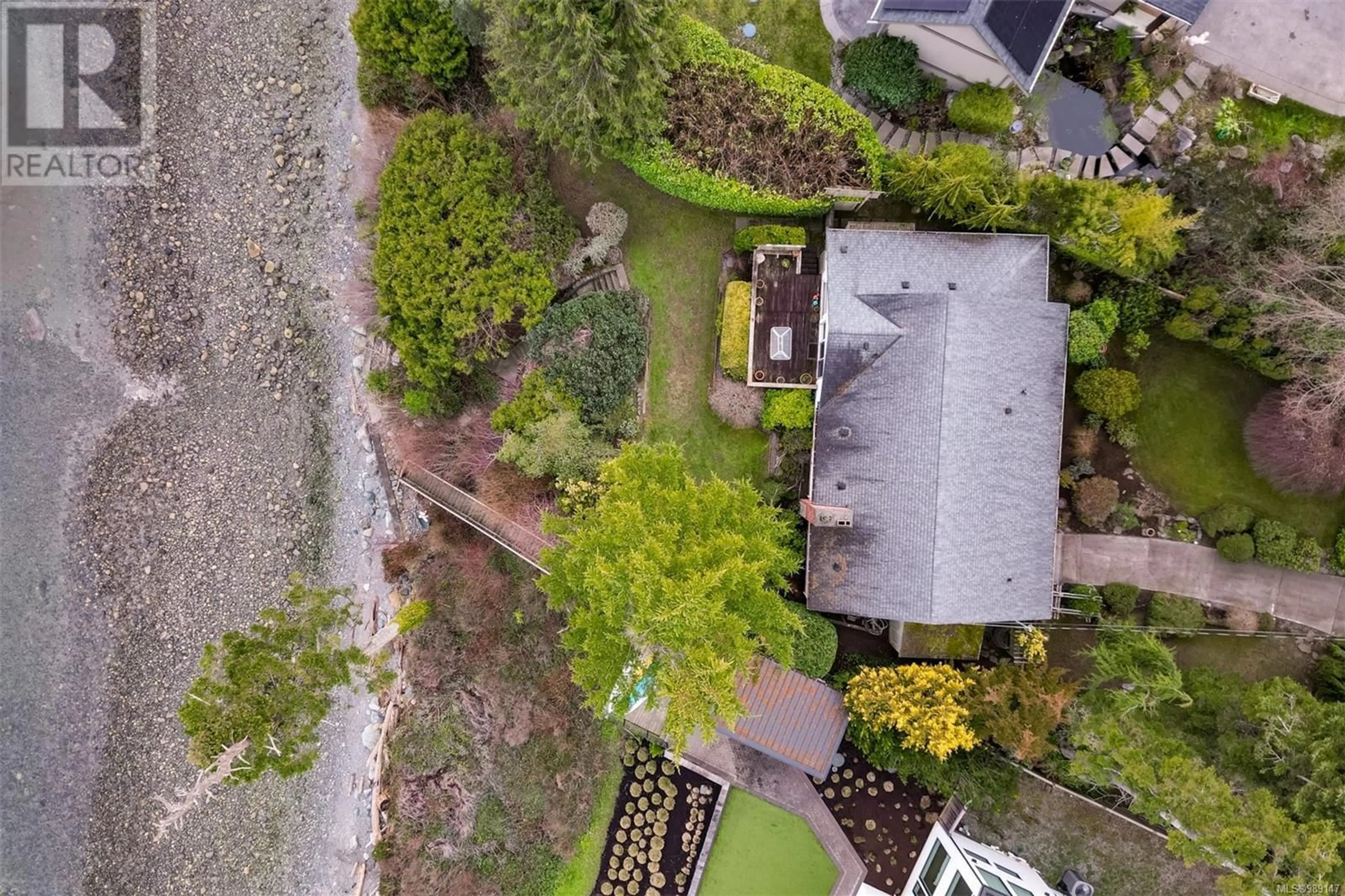 A pic from outside/outdoor area/front of a property/back of a property/a pic from drone, water/lake/river/ocean view for 8441 LOCHSIDE DRIVE, Central Saanich British Columbia V8M1T9