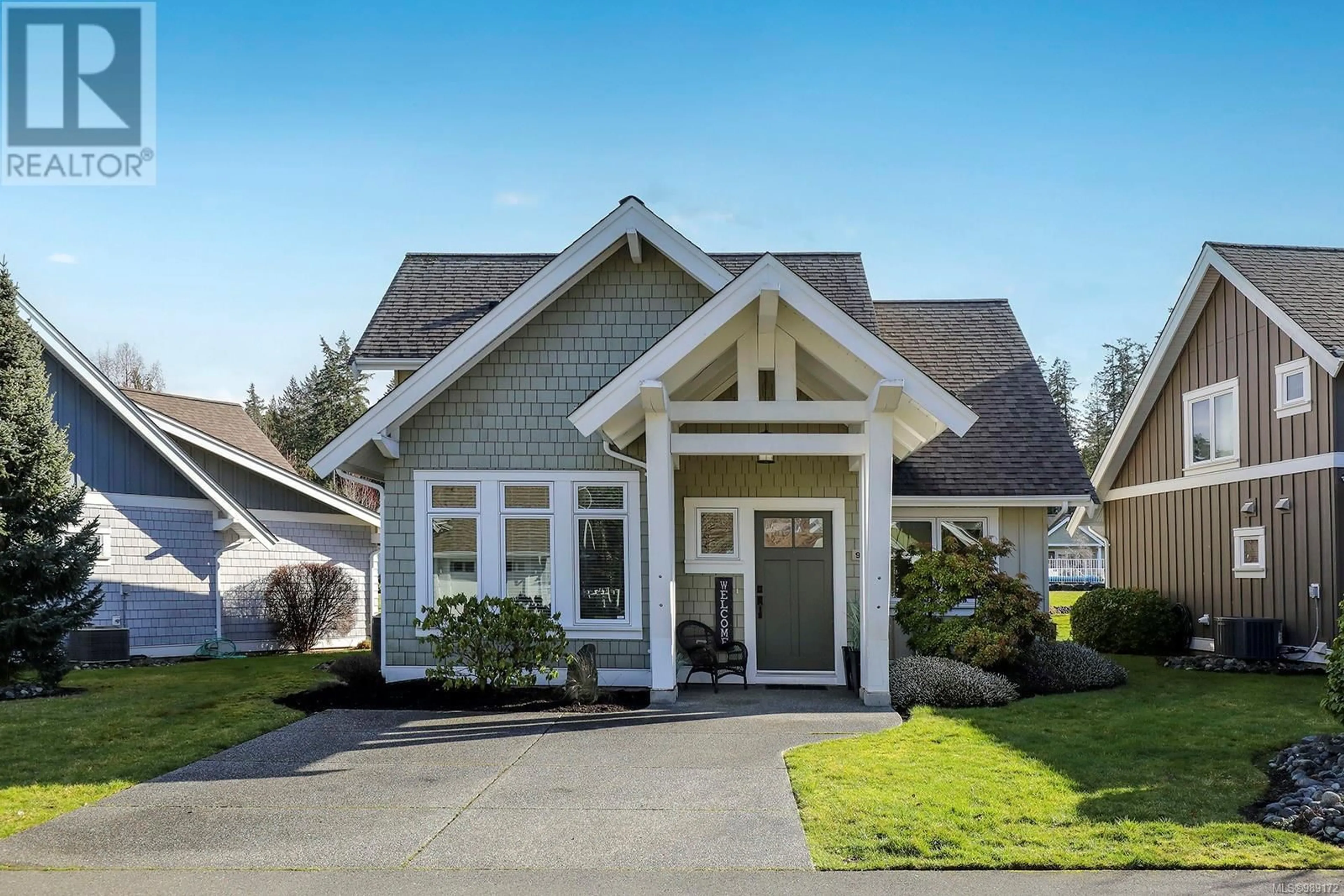 Home with vinyl exterior material, street for 9 - 5251 ISLAND HIGHWAY, Qualicum Beach British Columbia V9K2C1