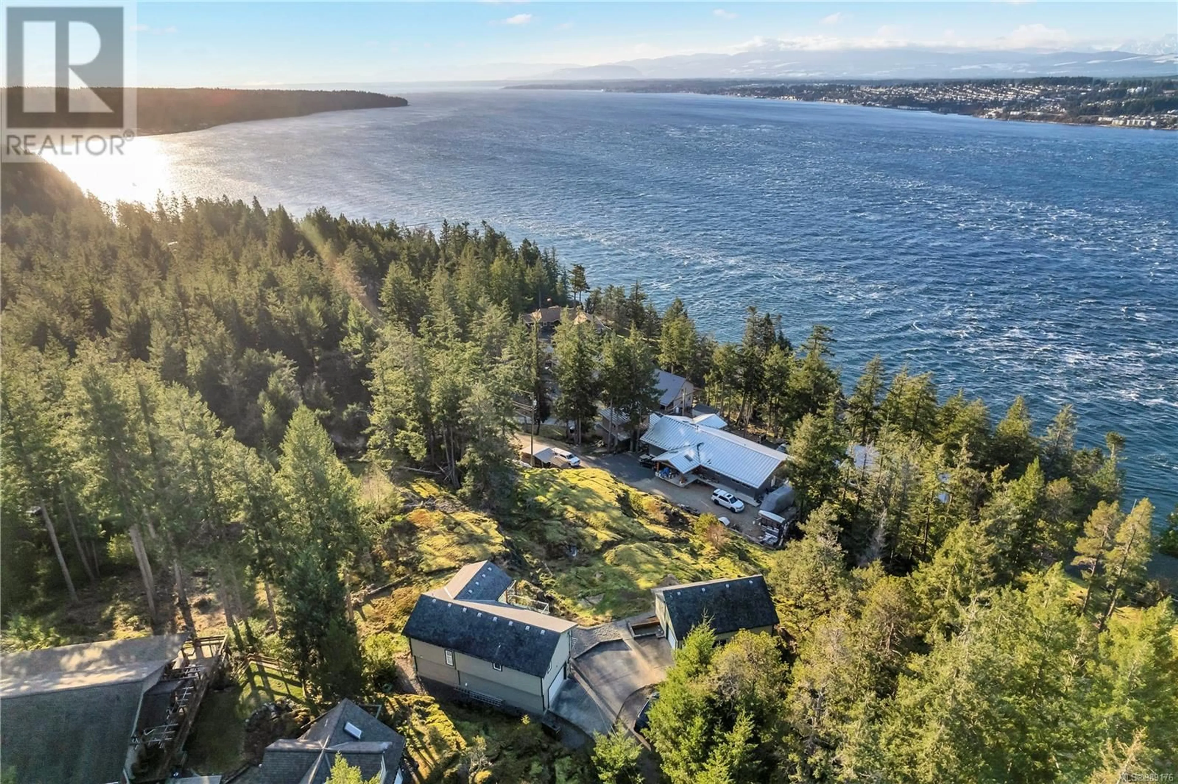 A pic from outside/outdoor area/front of a property/back of a property/a pic from drone, water/lake/river/ocean view for 5 620 Helanton Rd, Quadra Island British Columbia V0P1N0