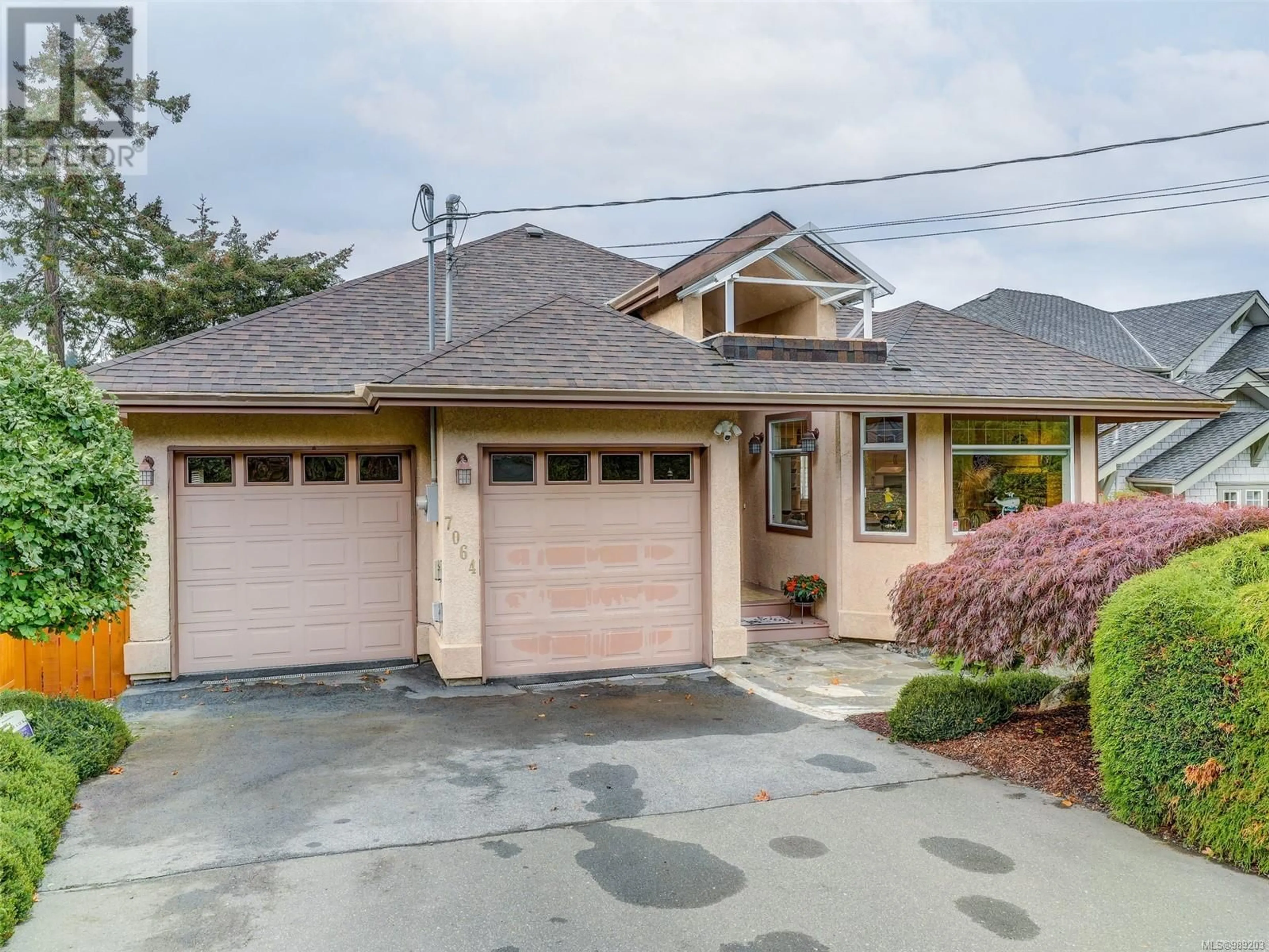 Home with brick exterior material, street for 7064 Brentwood Dr, Central Saanich British Columbia V8M1B6