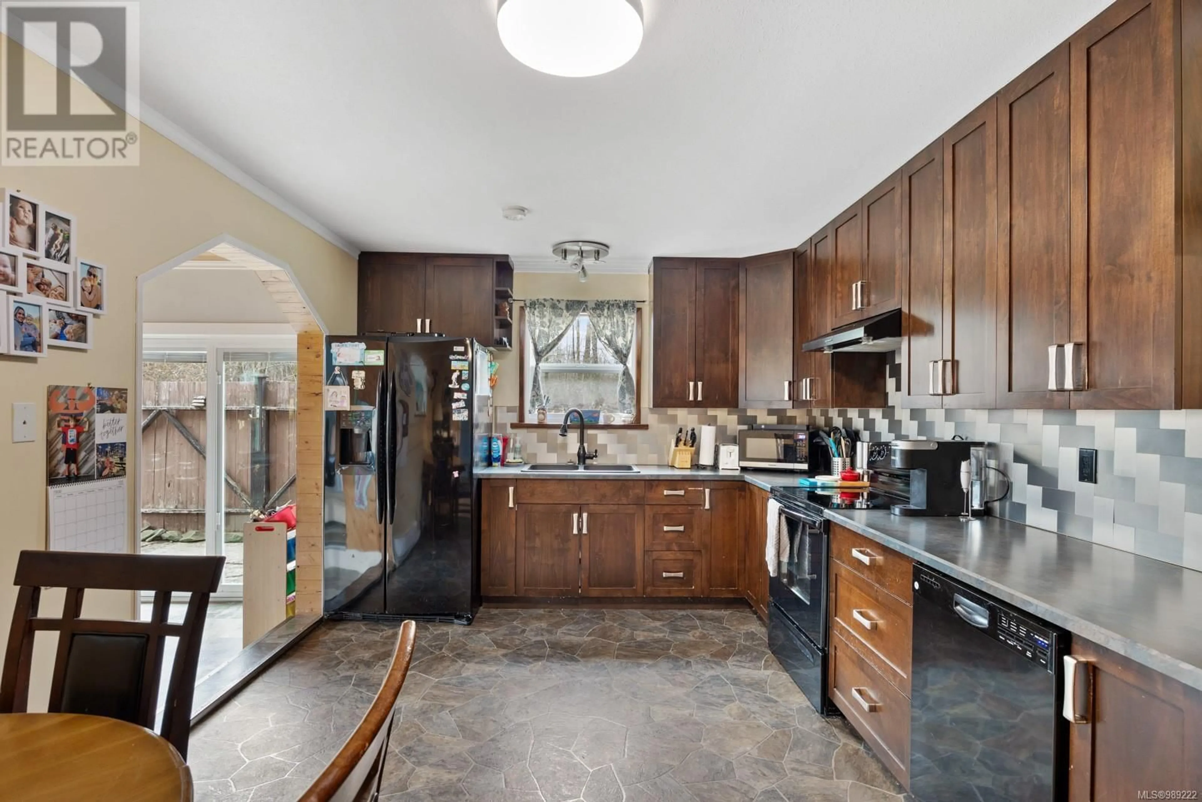 Open concept kitchen, ceramic/tile floor for 3011 Royston Rd, Cumberland British Columbia V0R1S0