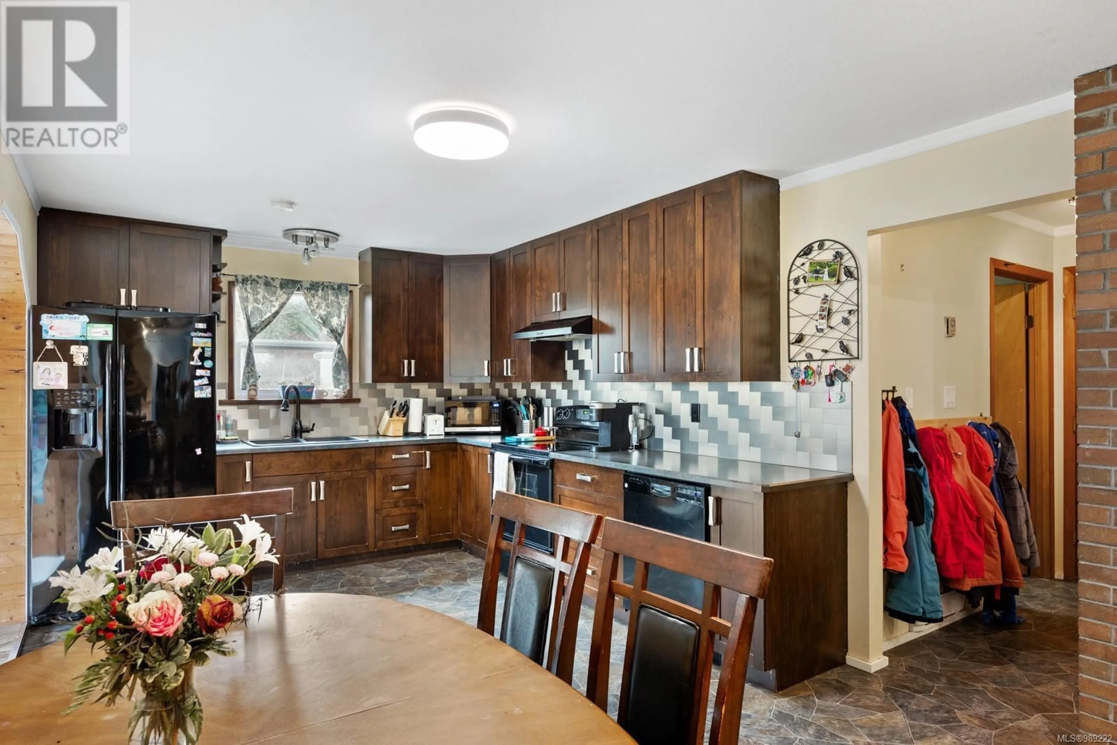 Open concept kitchen, ceramic/tile floor for 3011 Royston Rd, Cumberland British Columbia V0R1S0