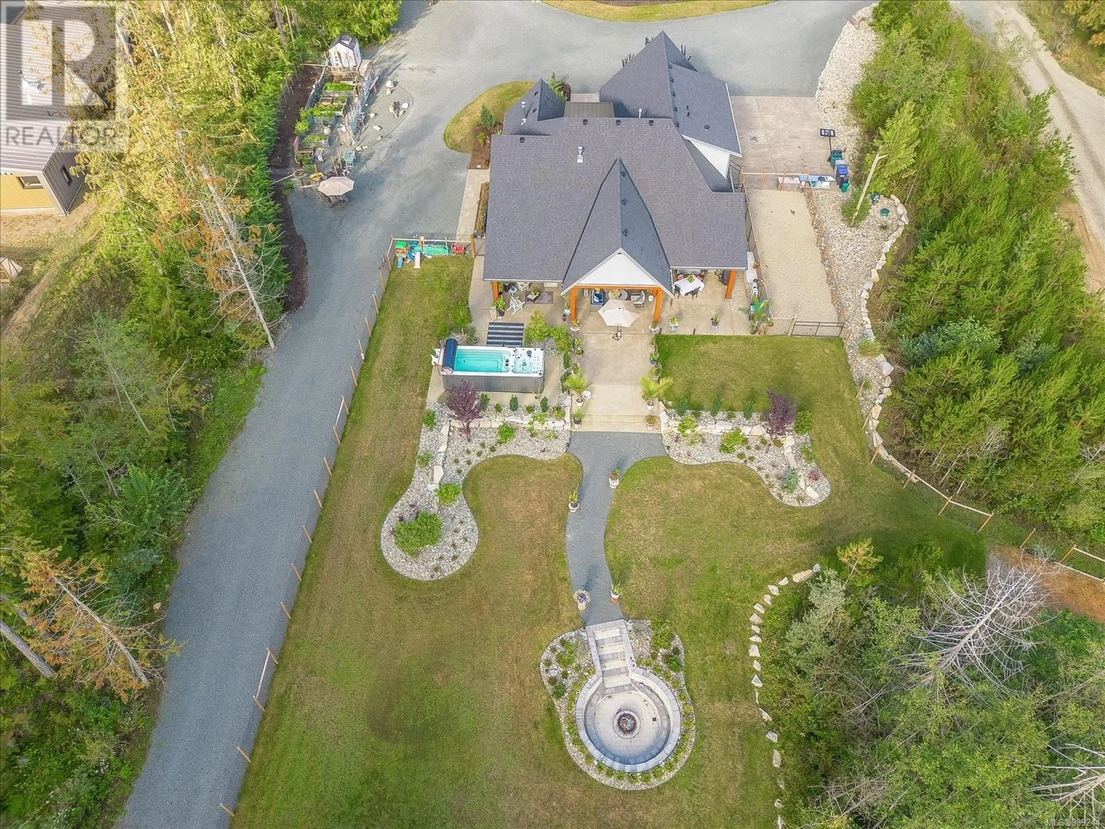 A pic from outside/outdoor area/front of a property/back of a property/a pic from drone, unknown for 1248 Station Rd, Coombs British Columbia V0R1M0