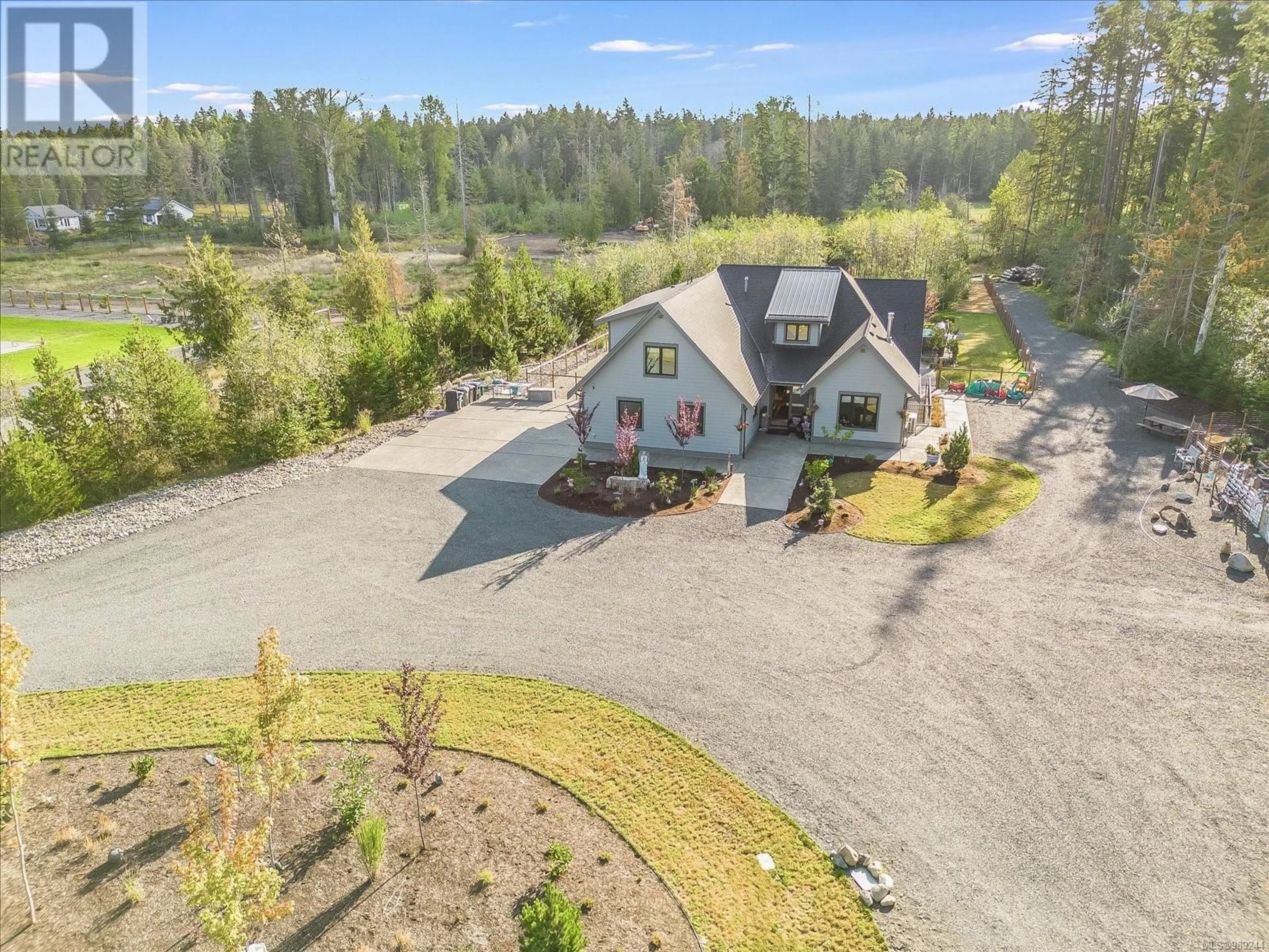 A pic from outside/outdoor area/front of a property/back of a property/a pic from drone, unknown for 1248 Station Rd, Coombs British Columbia V0R1M0