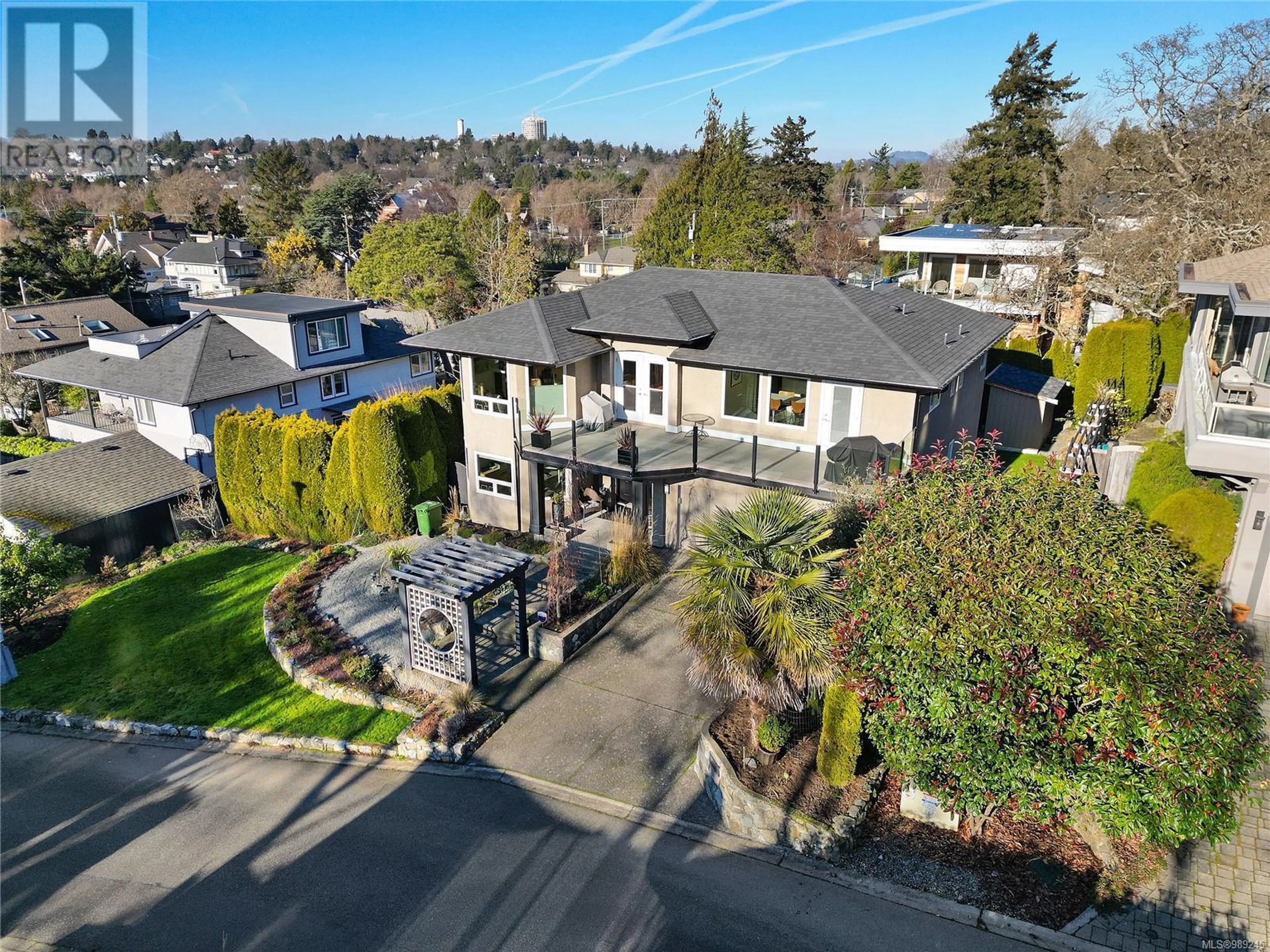 A pic from outside/outdoor area/front of a property/back of a property/a pic from drone, street for 1907 Quixote Lane, Victoria British Columbia V8S5L5