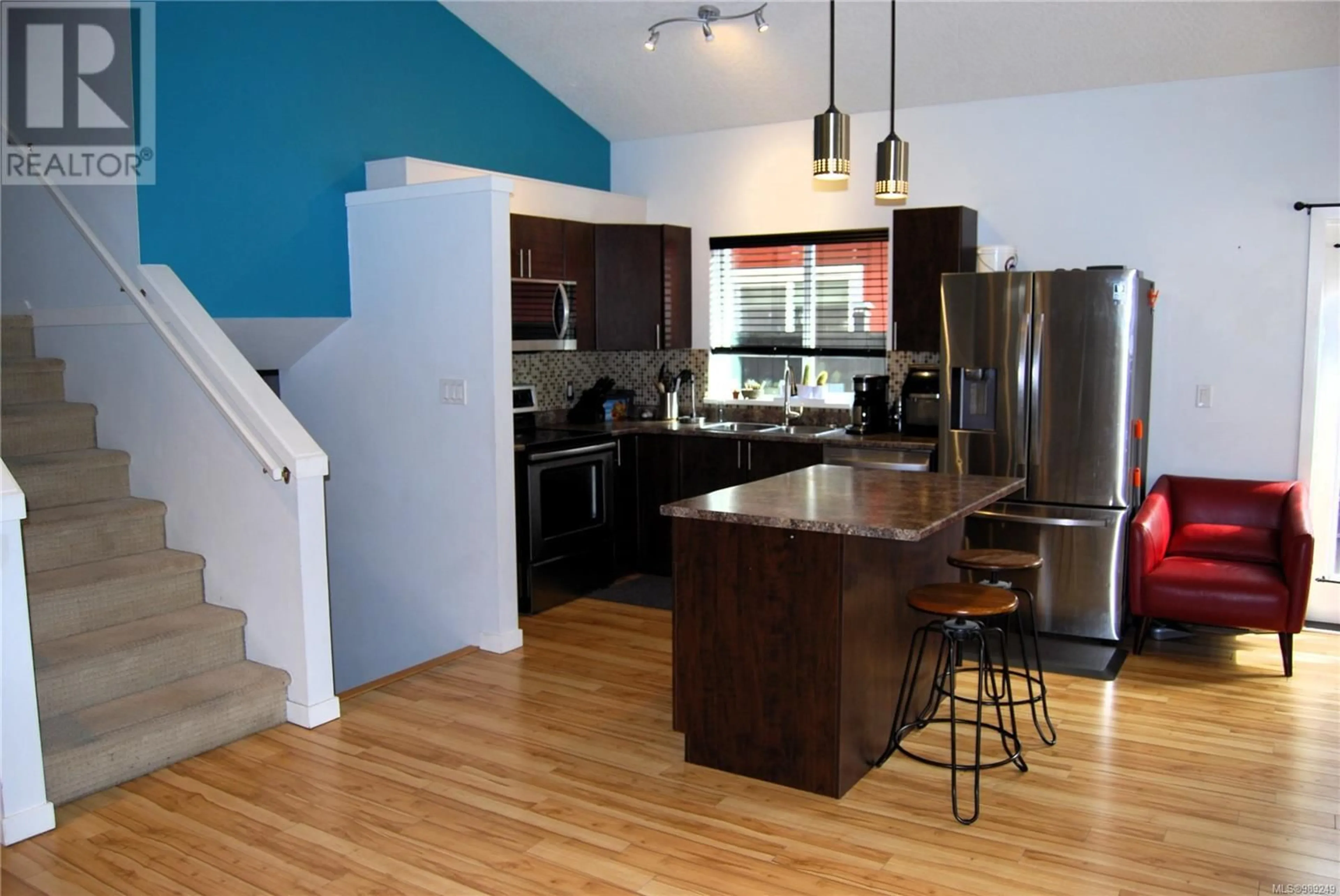 Open concept kitchen, wood/laminate floor for 3190 KETTLE CREEK CRESCENT, Langford British Columbia V9B0K6