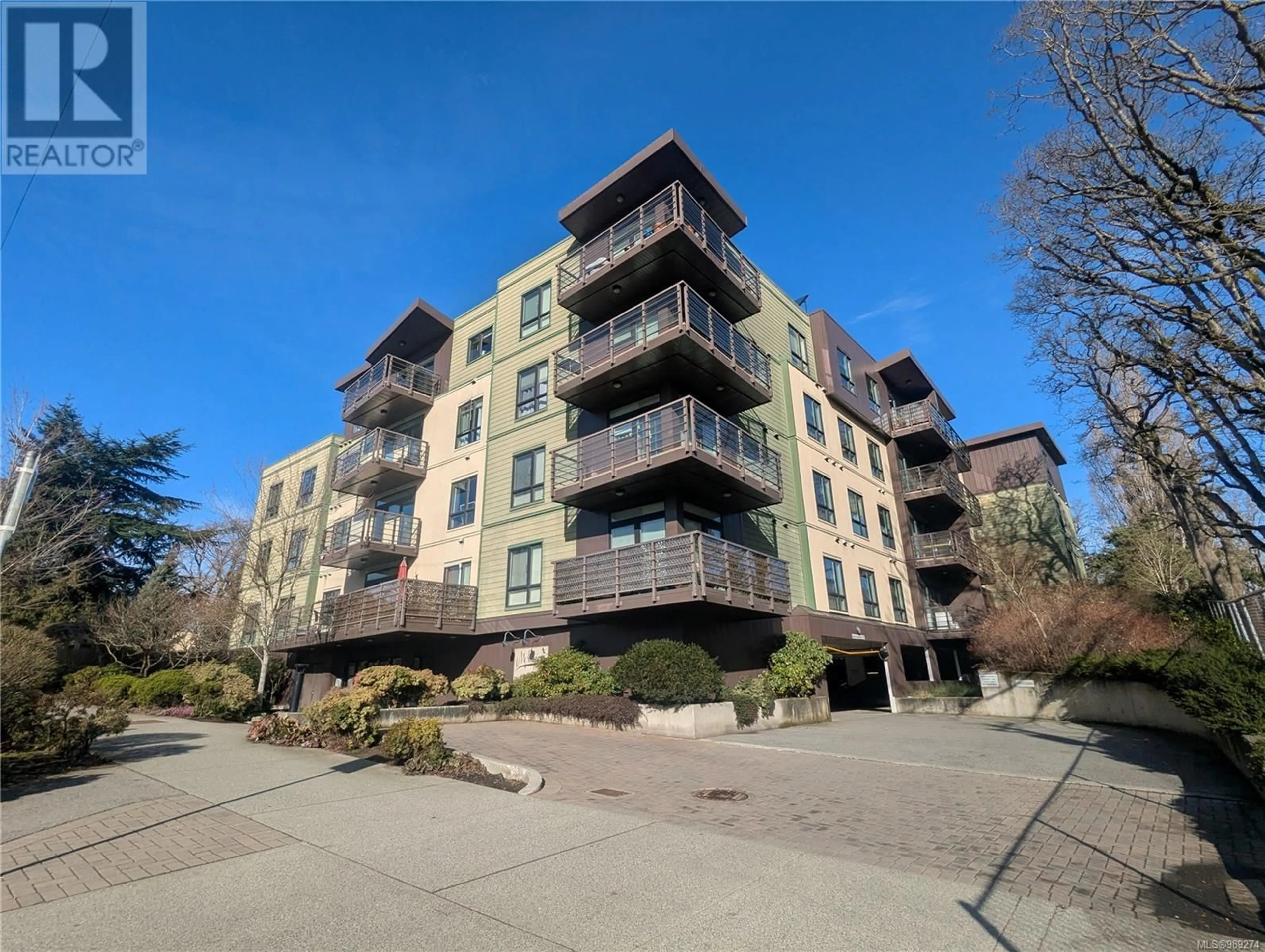 A pic from outside/outdoor area/front of a property/back of a property/a pic from drone, building for 306 - 982 MCKENZIE AVENUE, Saanich British Columbia V8X3G7