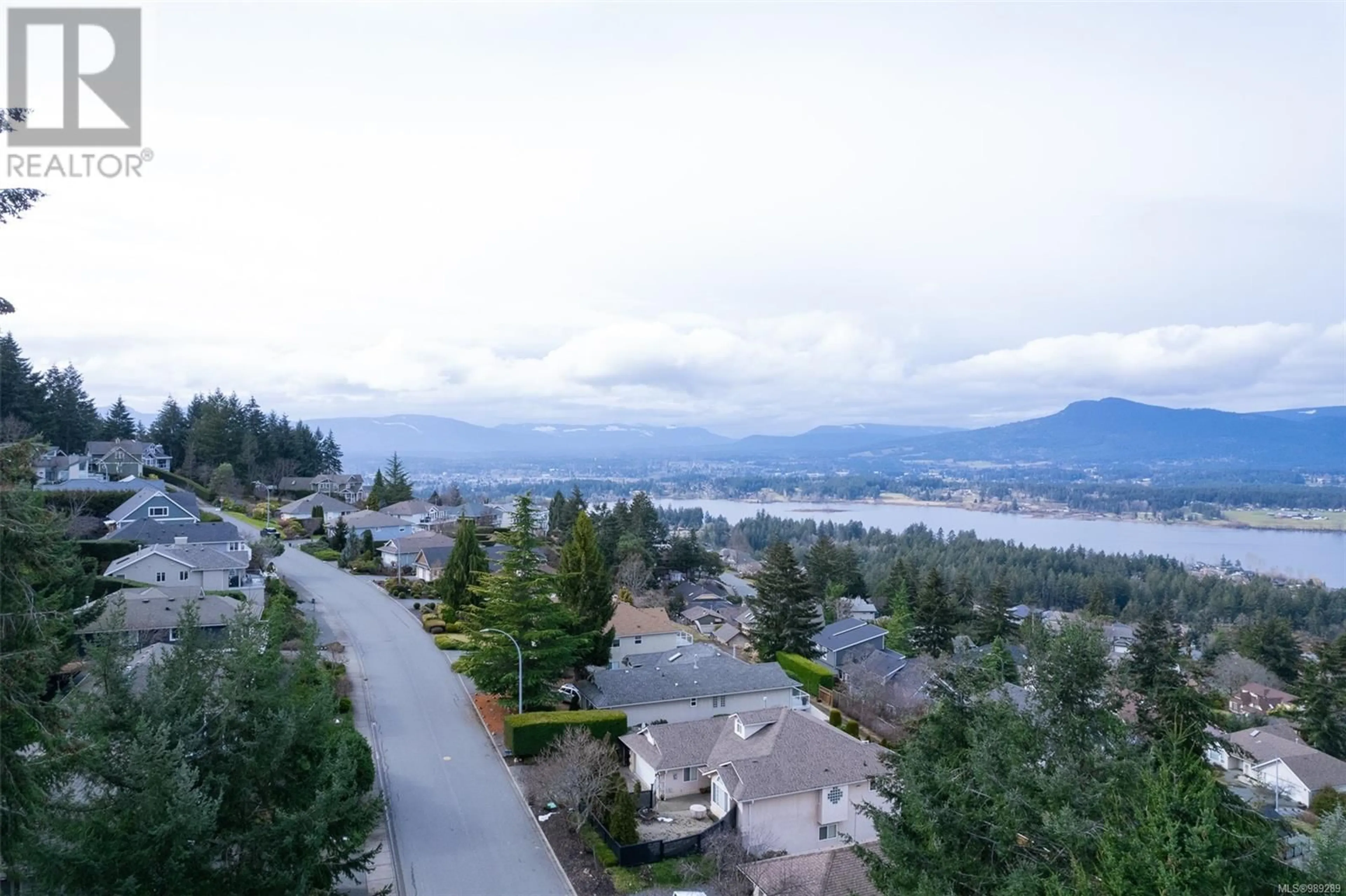 A pic from outside/outdoor area/front of a property/back of a property/a pic from drone, mountain view for 6010 Salish Rd, Duncan British Columbia V9L5P7