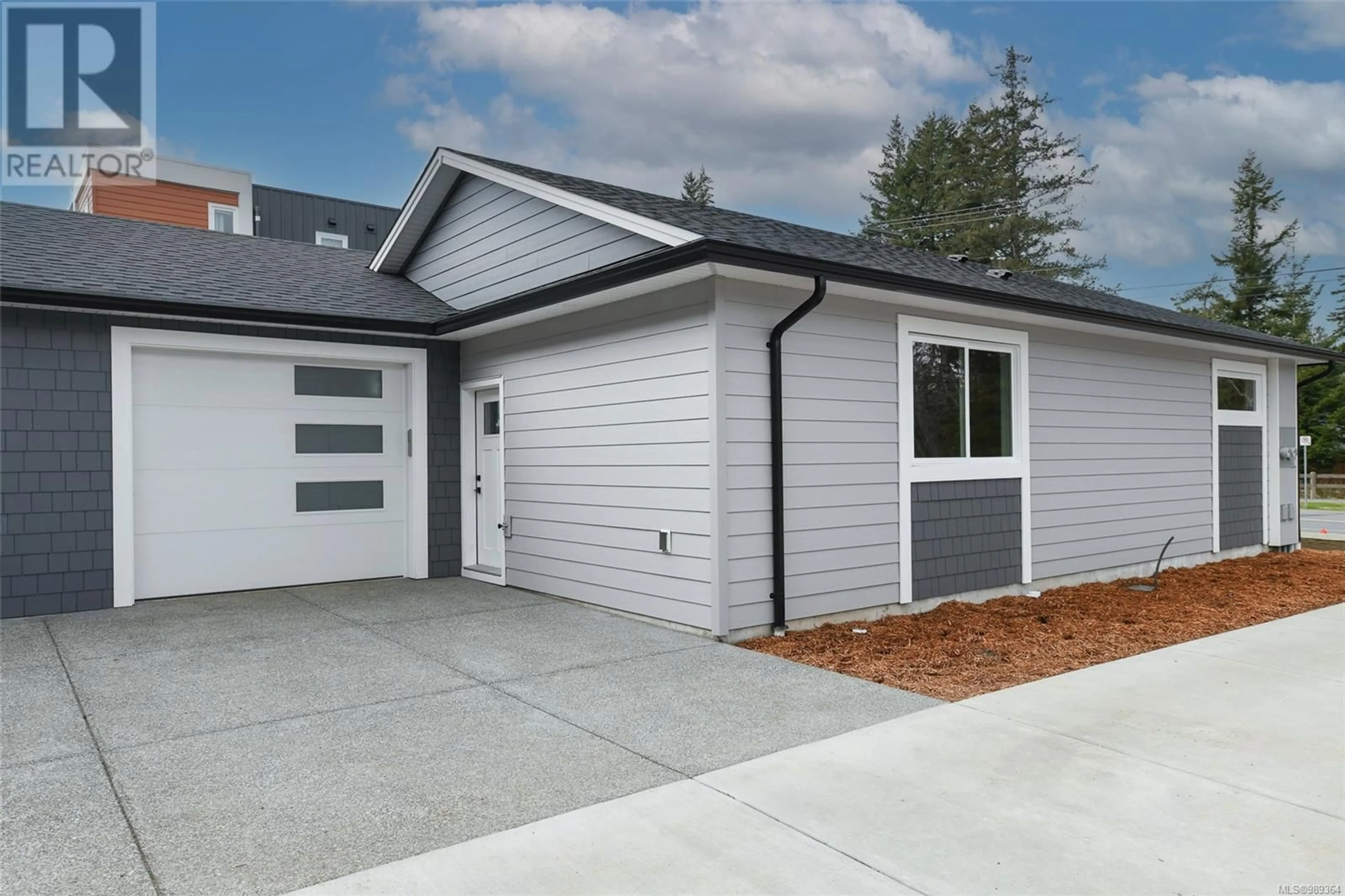 Home with vinyl exterior material, street for A 2311 McDonald Rd, Comox British Columbia V9M0C8