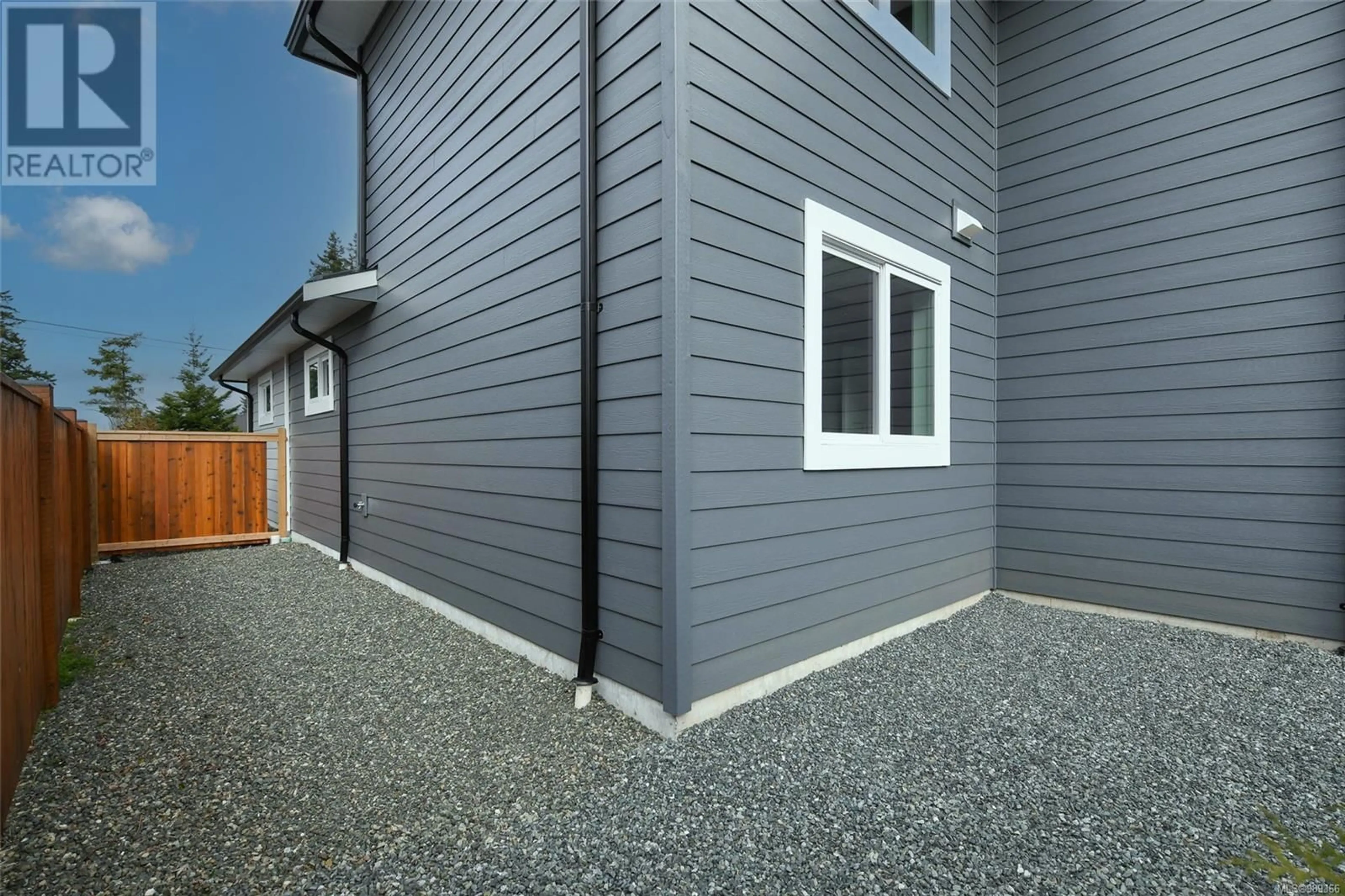 Home with vinyl exterior material, street for B 2311 McDonald Rd, Comox British Columbia V9M0C8