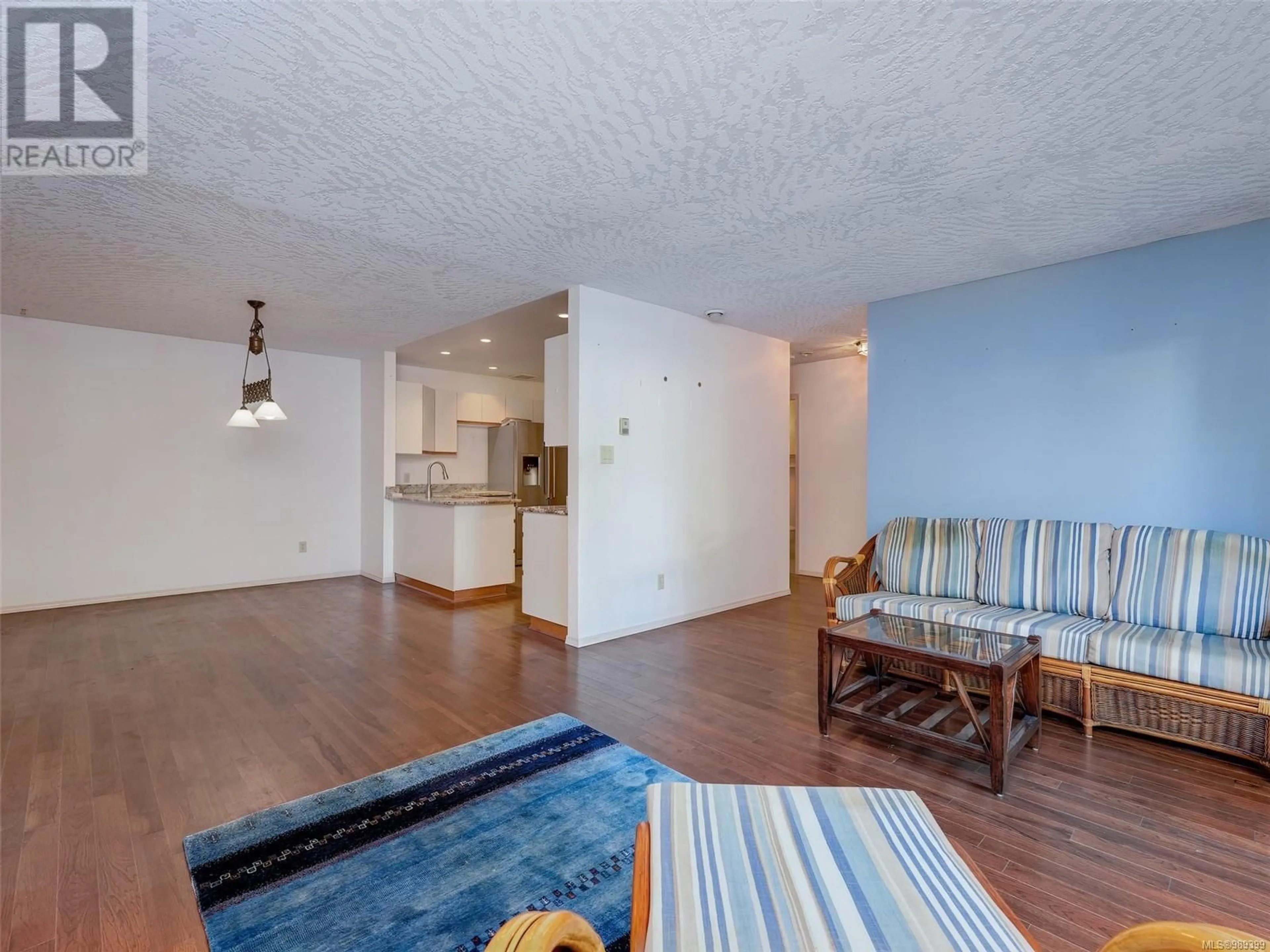 Living room with furniture, wood/laminate floor for 4 2775 Grainger Rd, Langford British Columbia V9B3K7