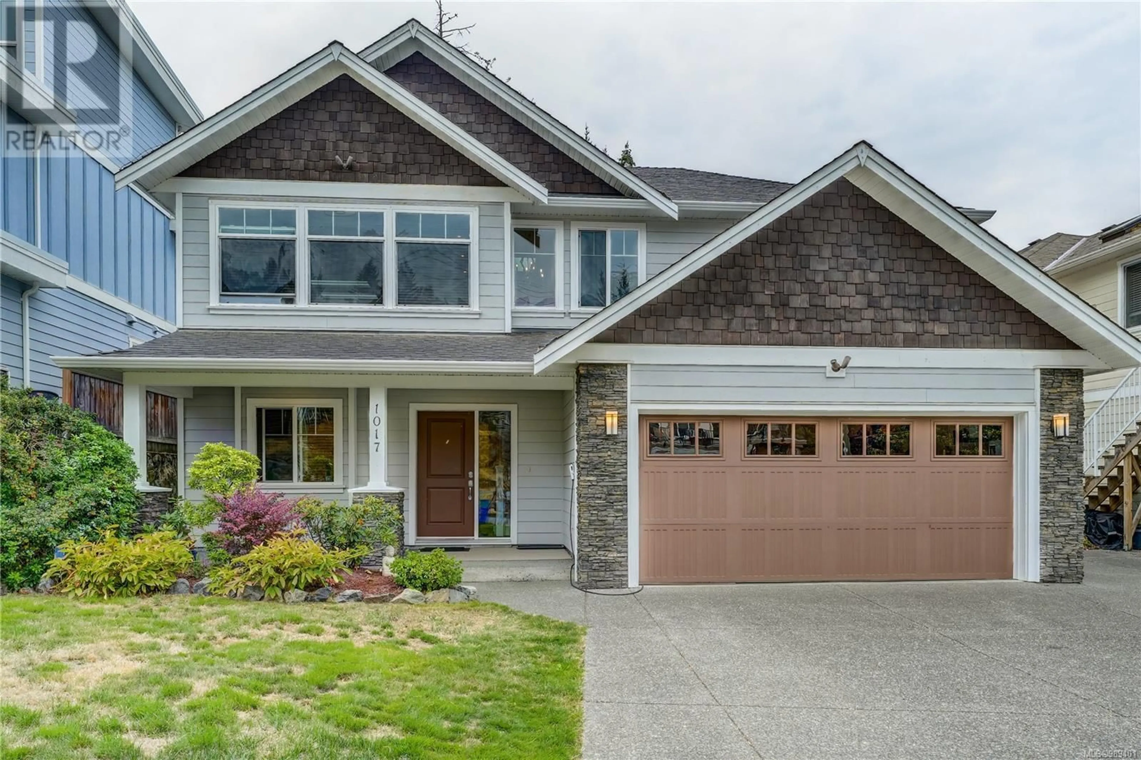 Home with vinyl exterior material, street for 1017 Citation Rd, Langford British Columbia V9B5T1