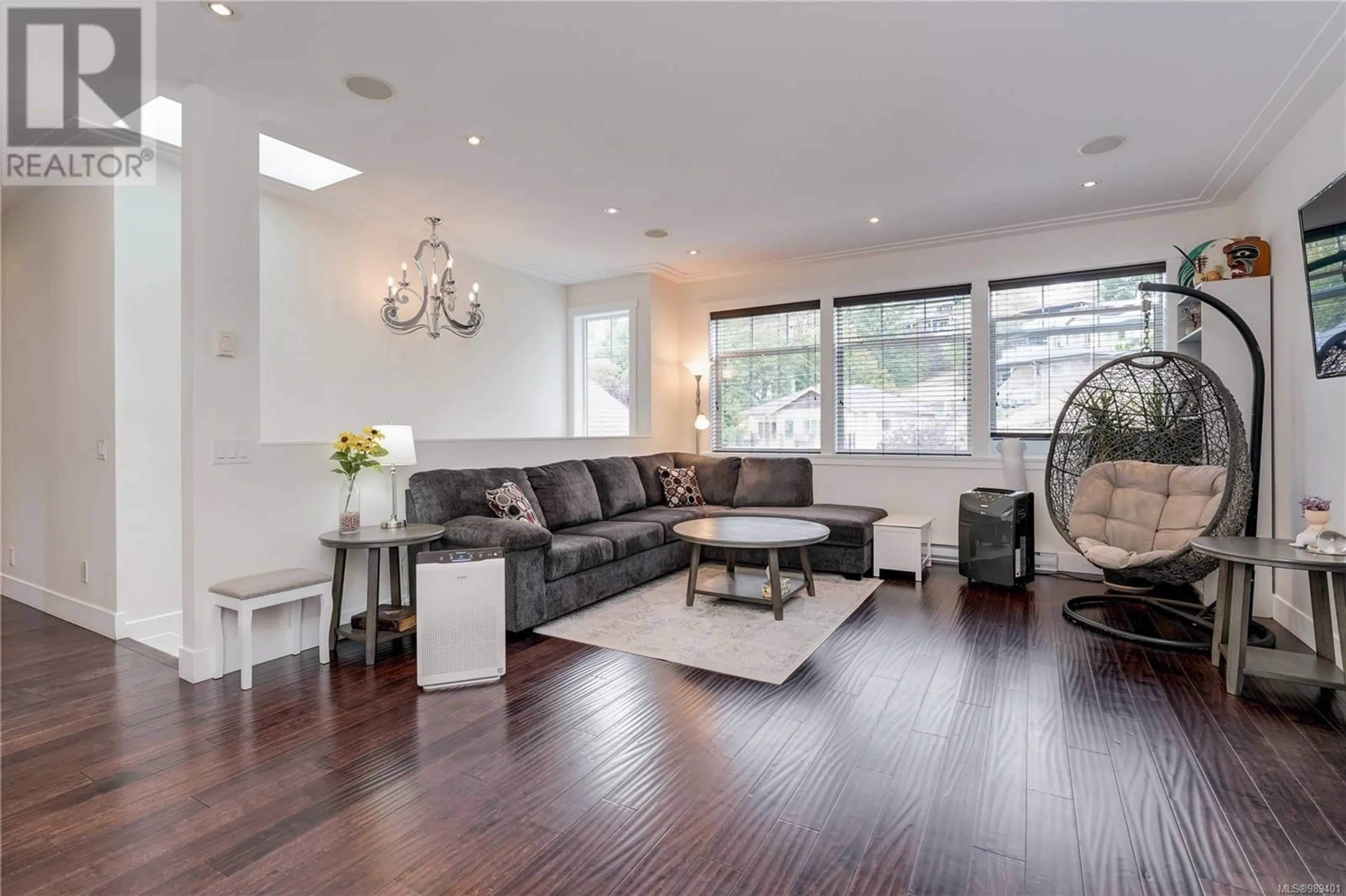 Living room with furniture, wood/laminate floor for 1017 Citation Rd, Langford British Columbia V9B5T1