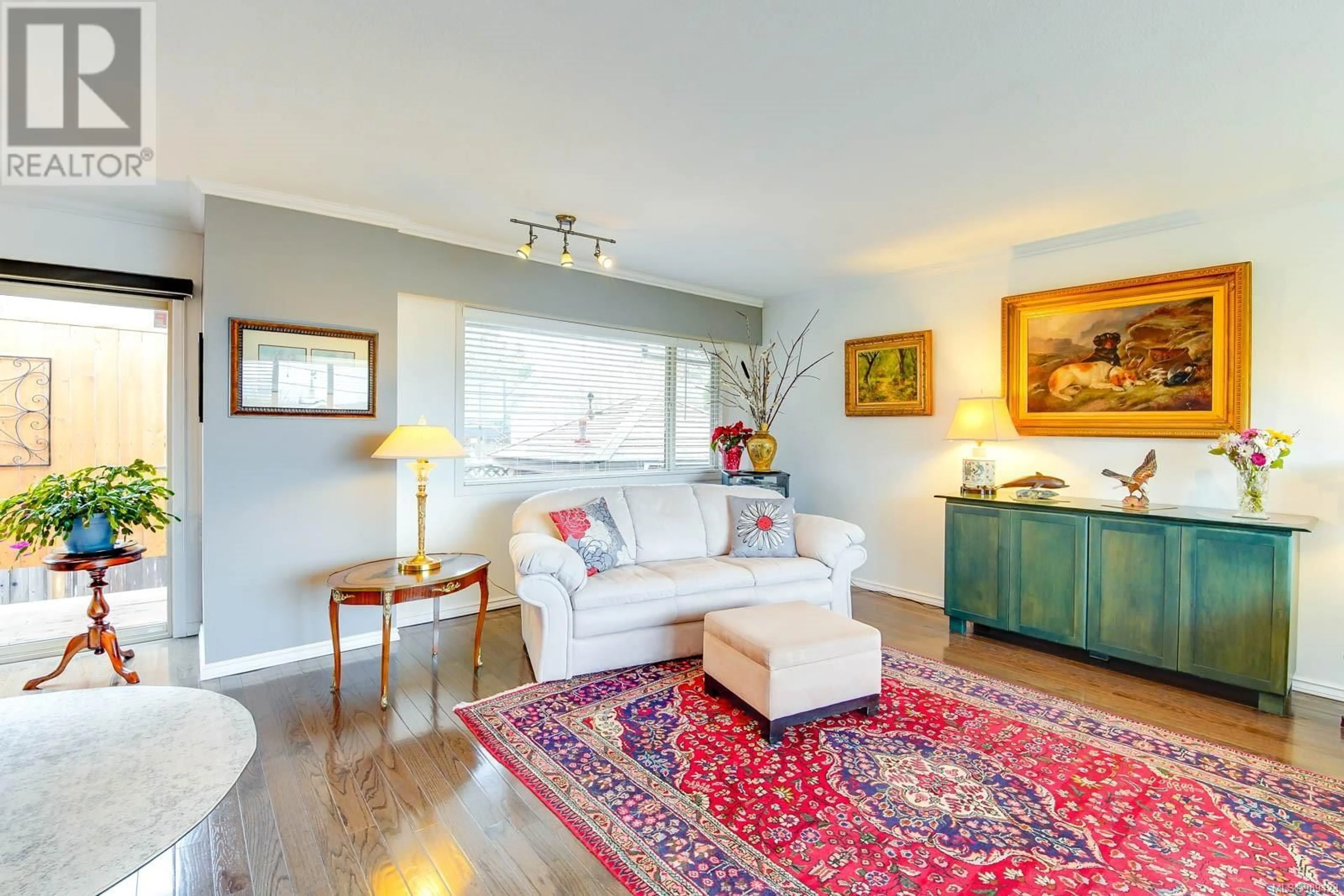 Living room with furniture, wood/laminate floor for 4624 Paterson Pl, Port Alberni British Columbia V9Y5K5