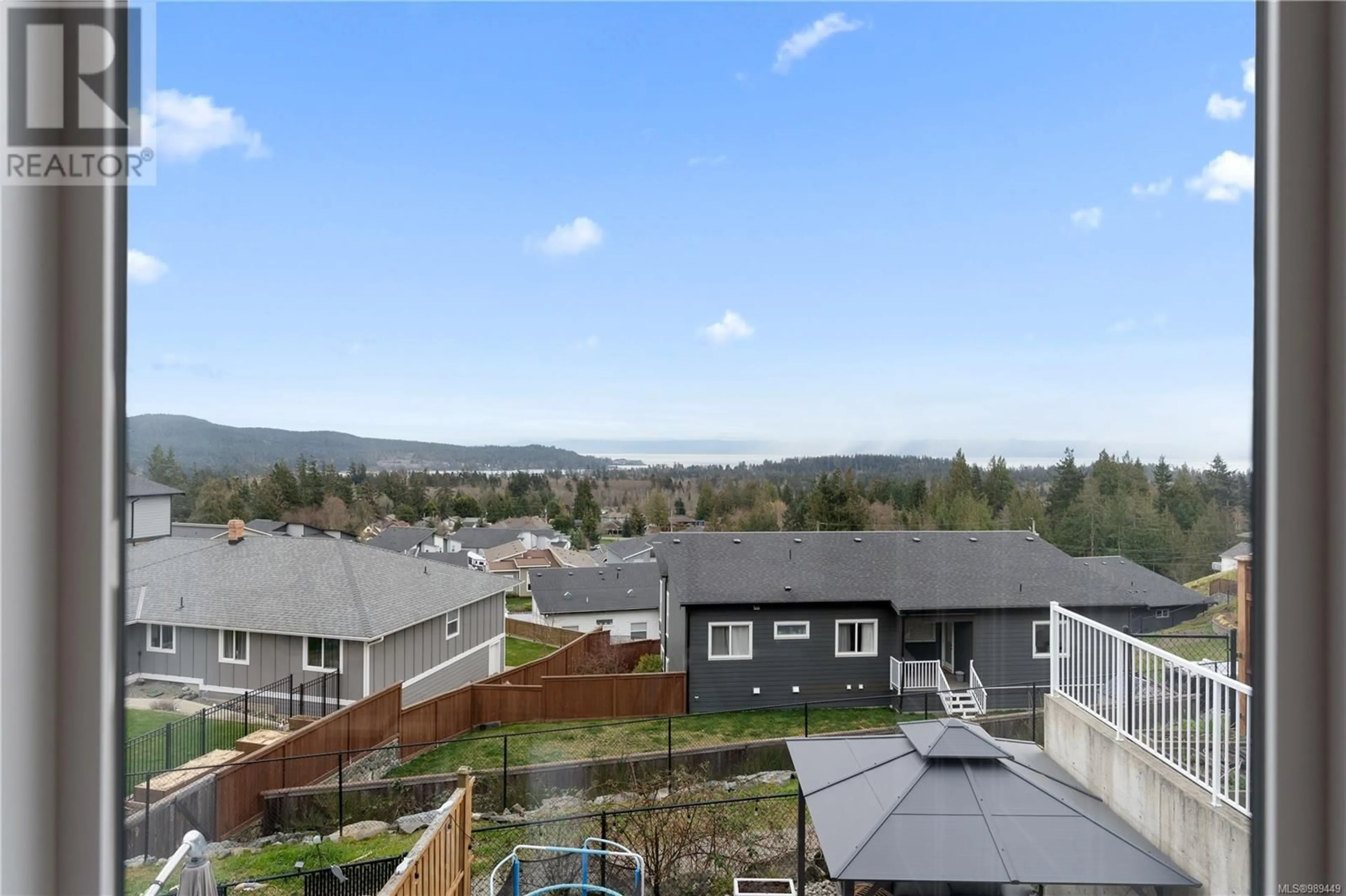 A pic from outside/outdoor area/front of a property/back of a property/a pic from drone, mountain view for 7033 Brailsford Pl, Sooke British Columbia V9Z1J7