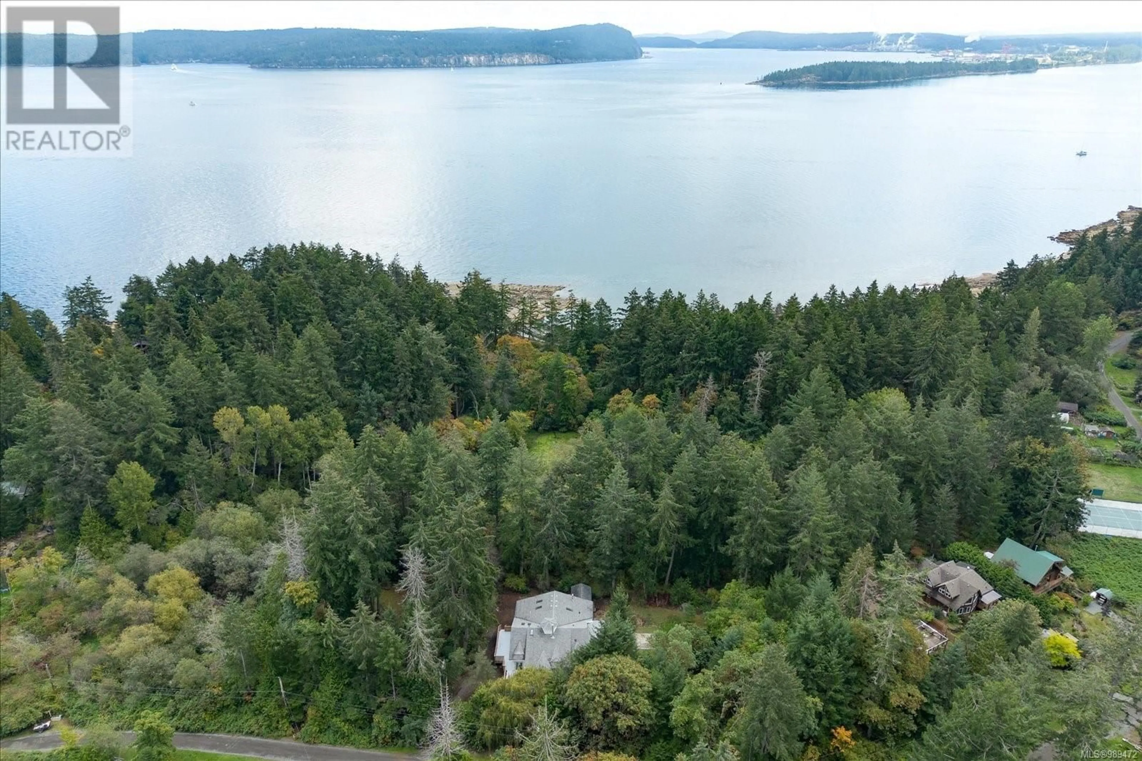 A pic from outside/outdoor area/front of a property/back of a property/a pic from drone, water/lake/river/ocean view for 88 Captain Morgans Blvd, Protection Island British Columbia V9R5K9