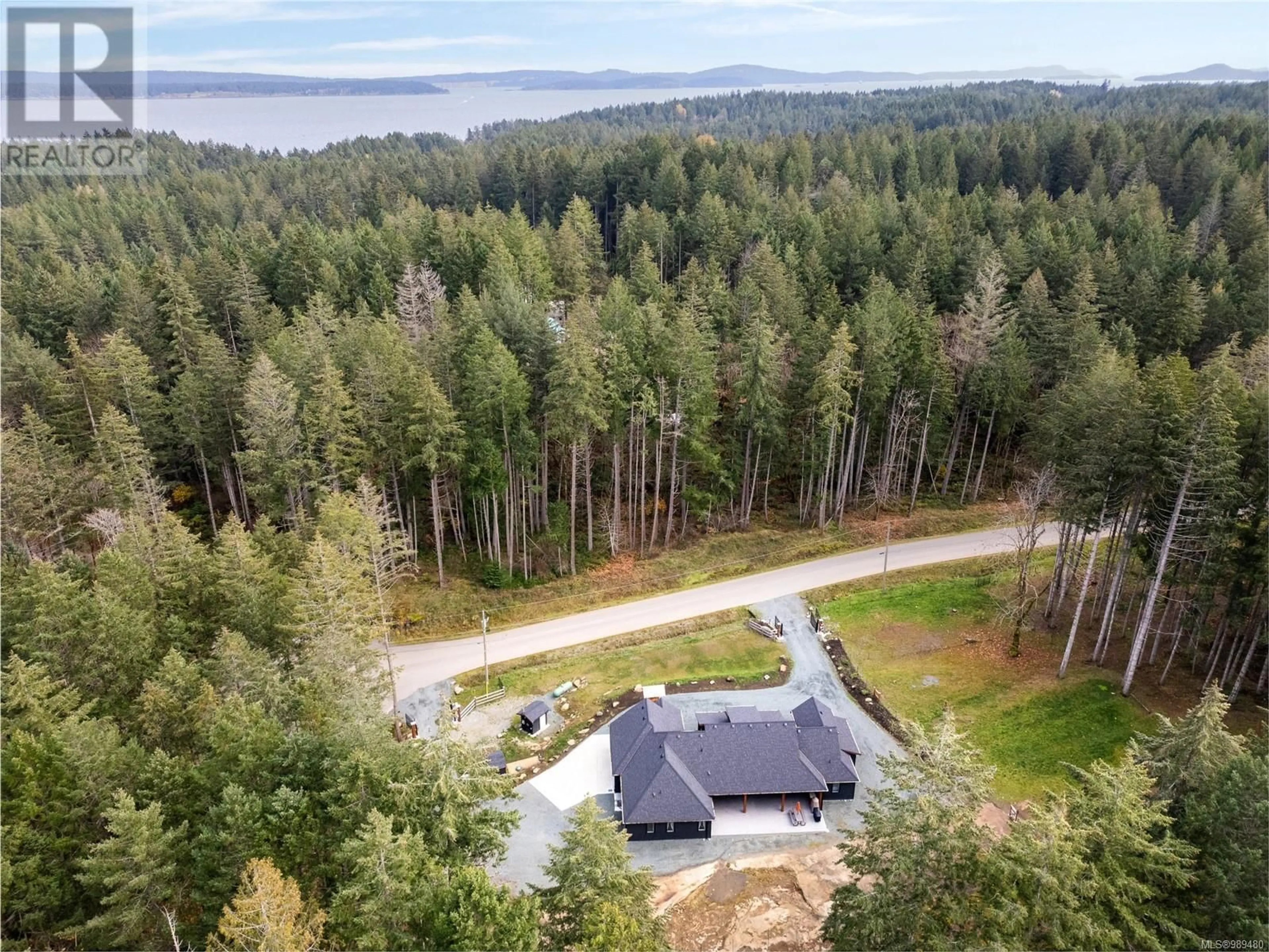 A pic from outside/outdoor area/front of a property/back of a property/a pic from drone, forest/trees view for 2245 Tiara Pl, Nanaimo British Columbia V9X1W8