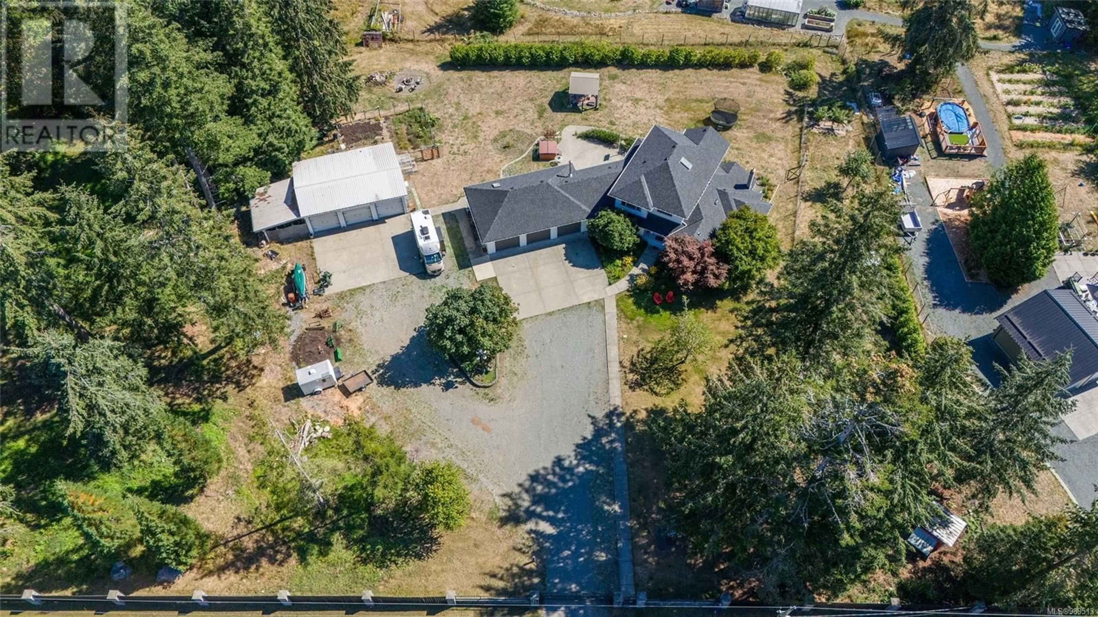 A pic from outside/outdoor area/front of a property/back of a property/a pic from drone, street for 2096 MAY ROAD, Comox British Columbia V9J1X7