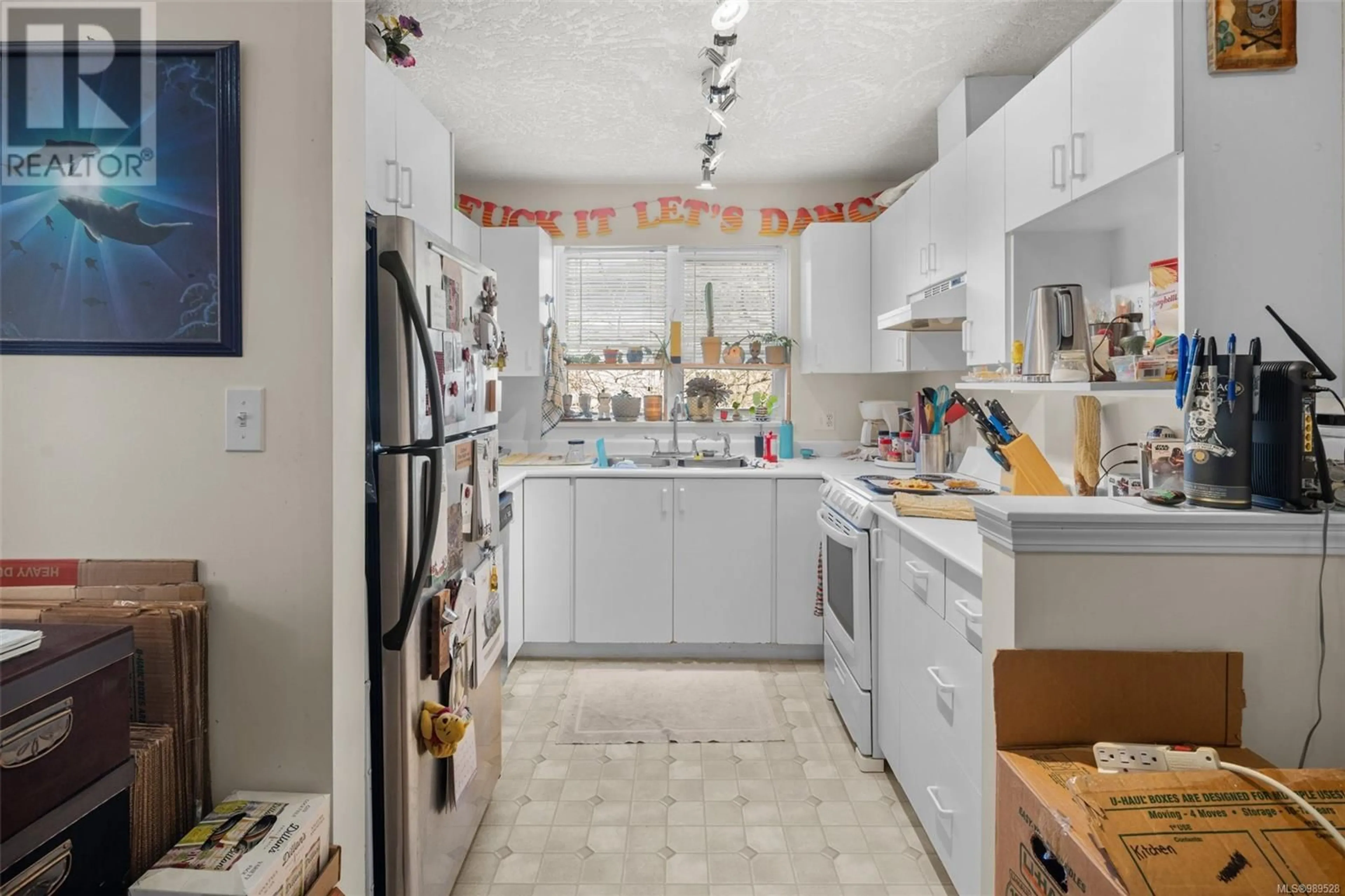 Standard kitchen, ceramic/tile floor for 203 3180 Albina St, Saanich British Columbia V9A1Z5