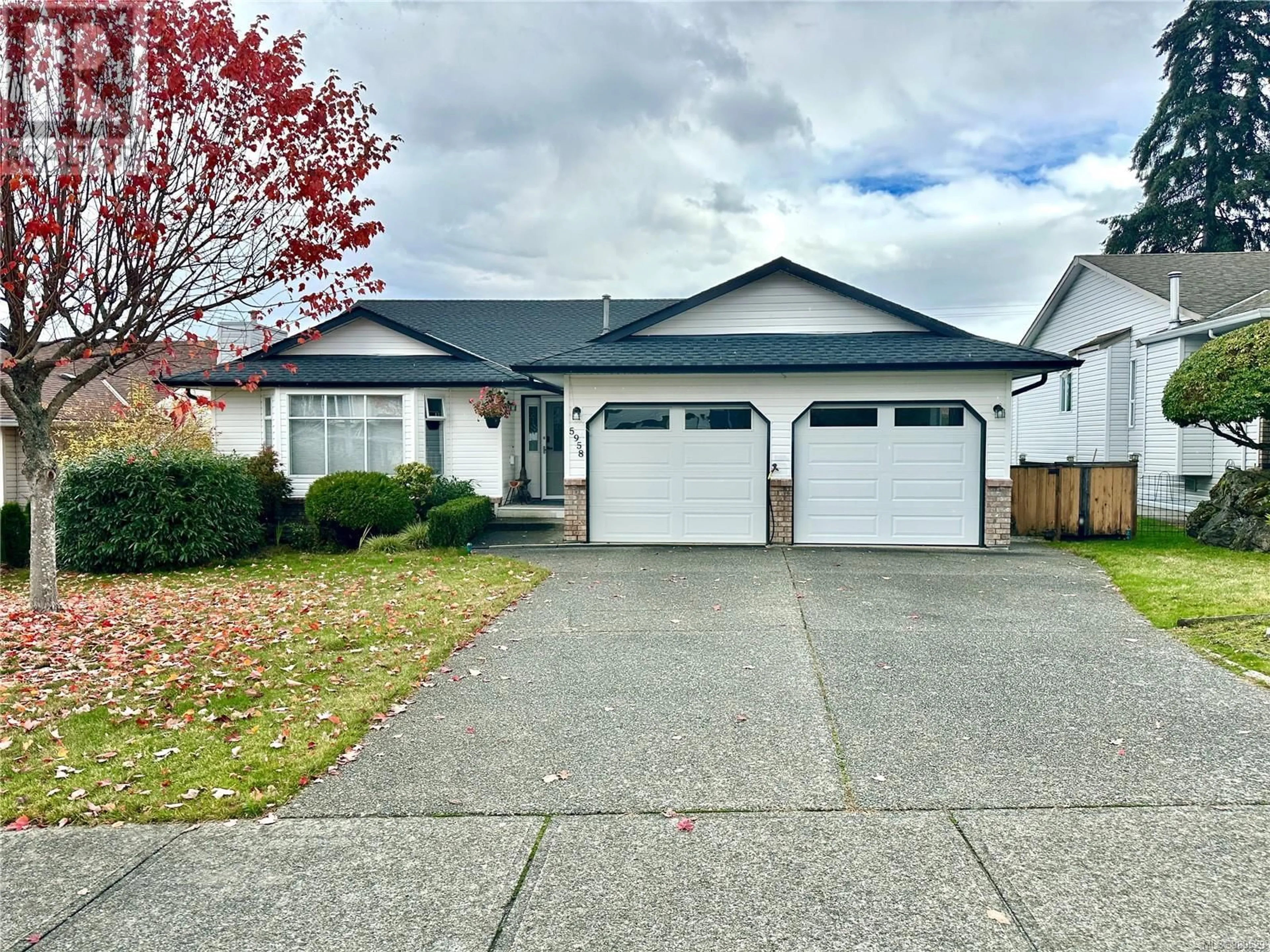 Home with vinyl exterior material, street for 5958 Tweedsmuir Cres, Nanaimo British Columbia V9T5Y7